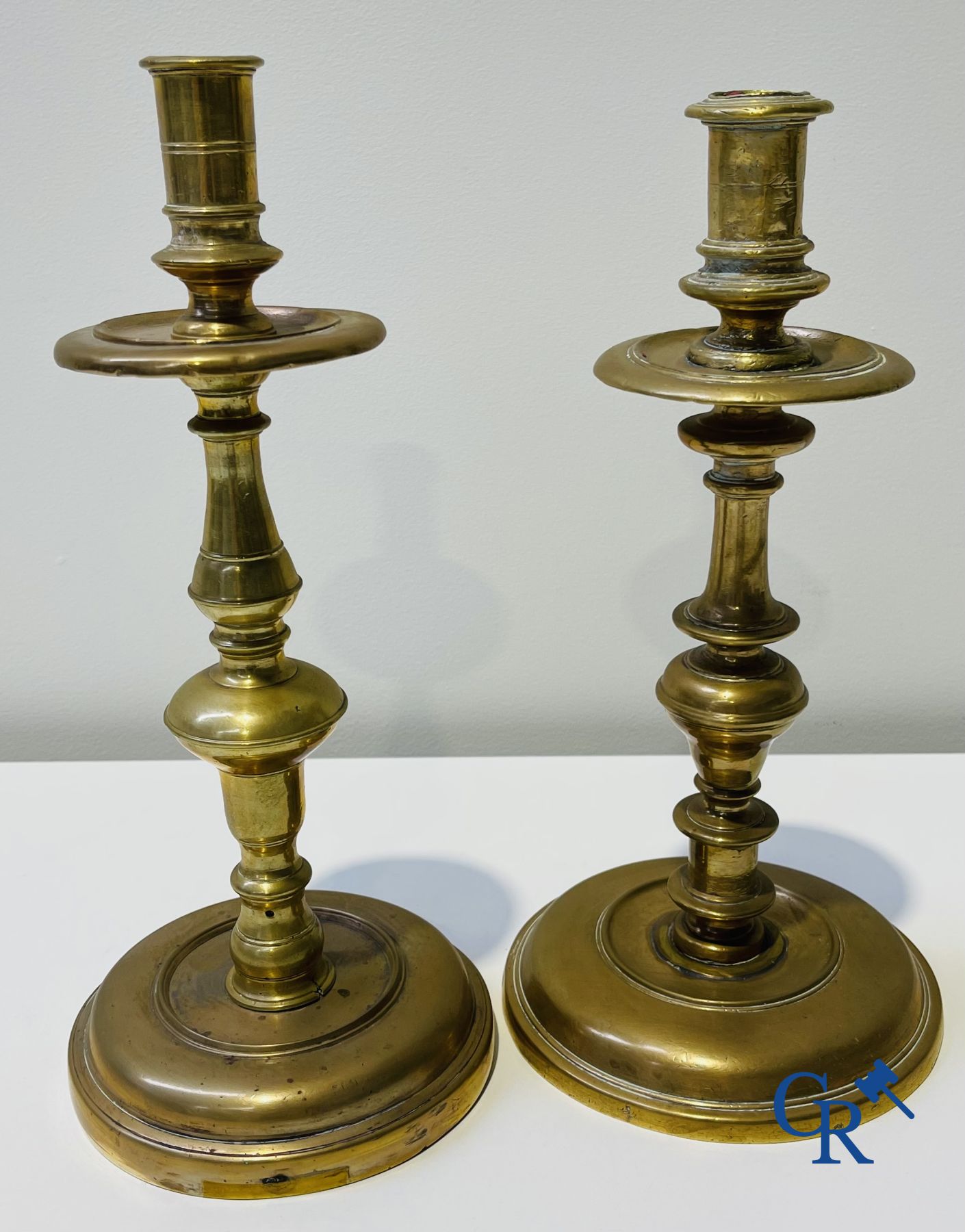 A lot of 2 large baptismal dishes, a portrait dish, 2 candlesticks and a holy water bucket. 16th-17th century.