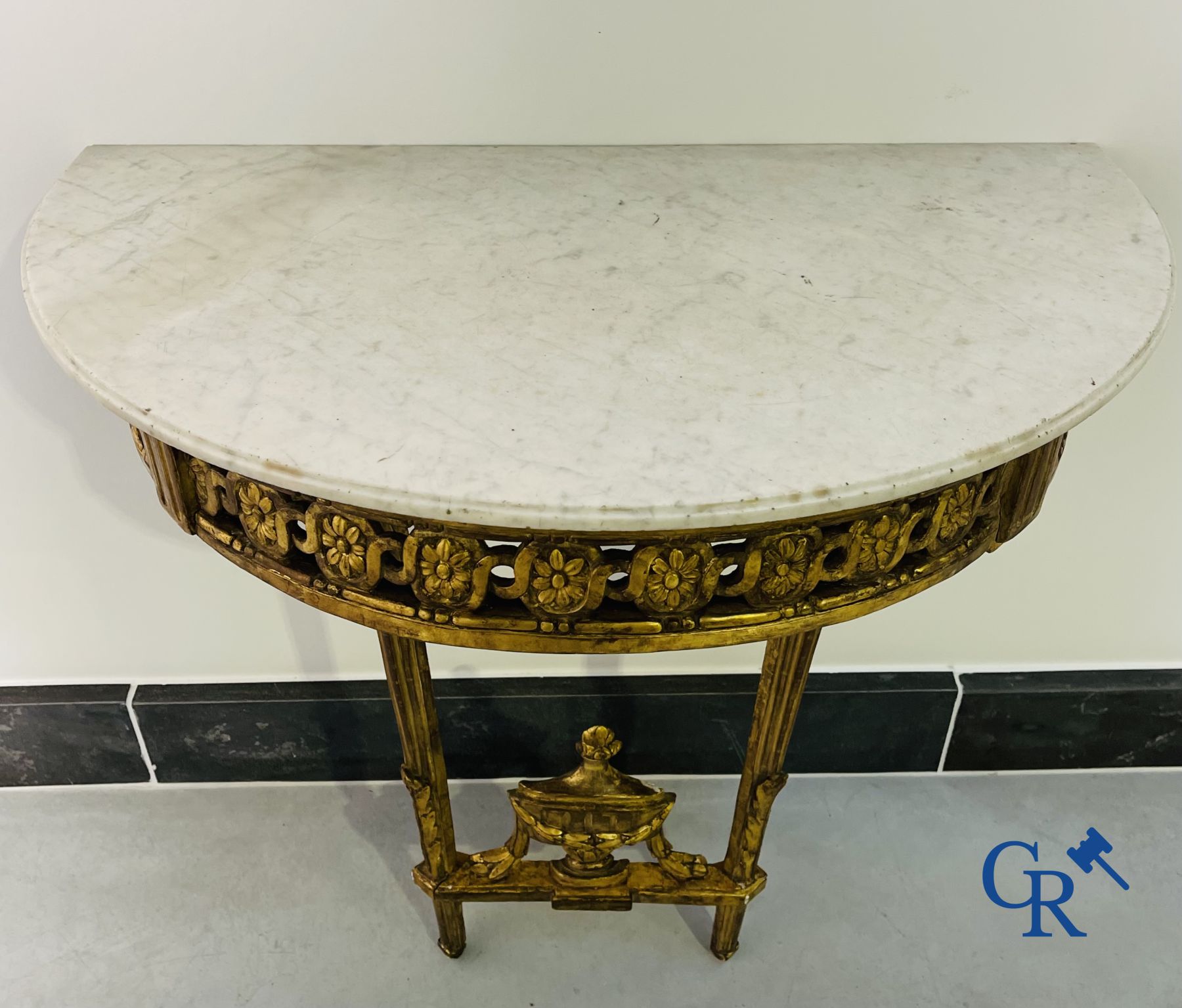 Furniture: Wood sculpted and gilded crescent shaped console. LXVI-period.