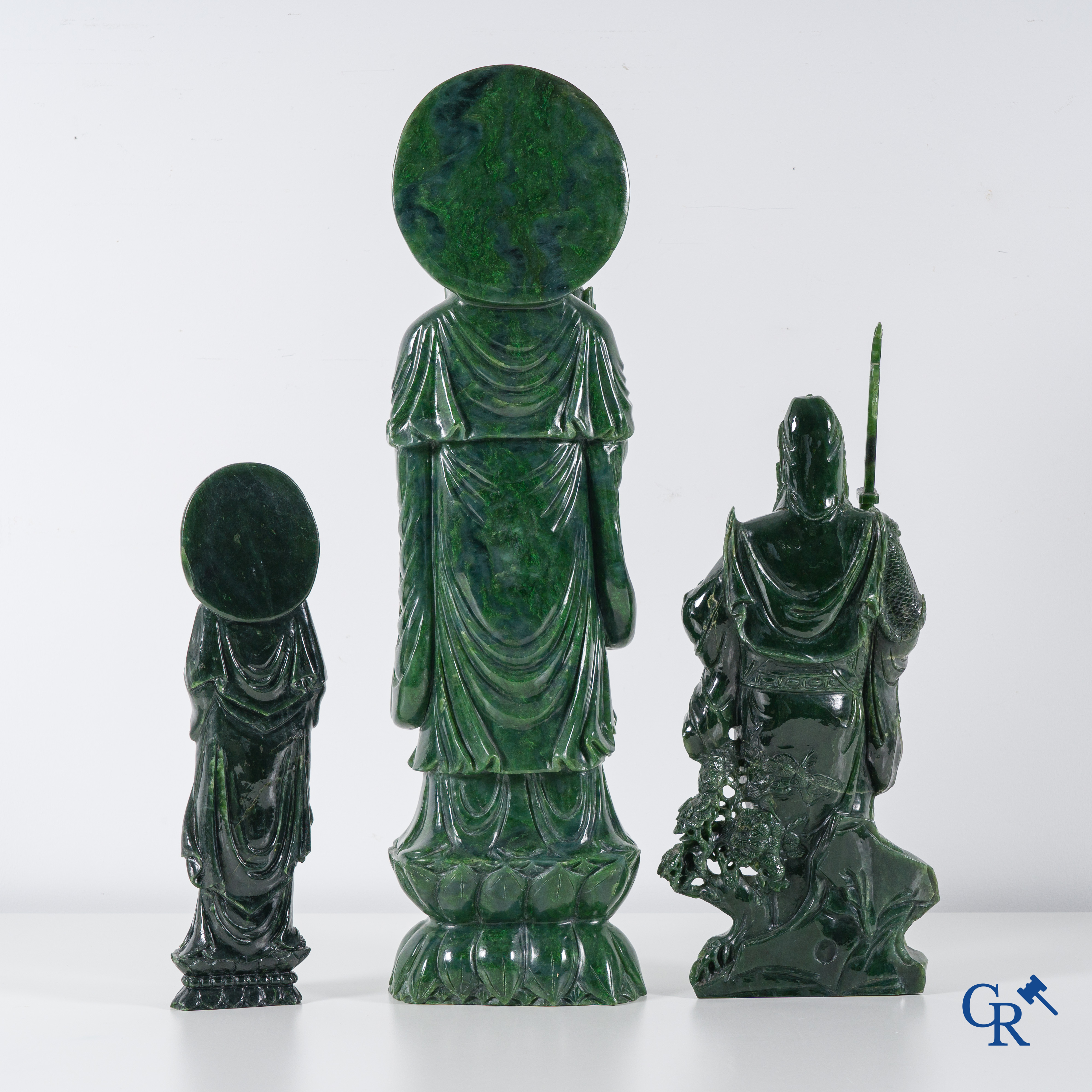 Asian Art: 3 Chinese jadeite figures of a standing Guanyin and a Chinese warrior. 20th century.