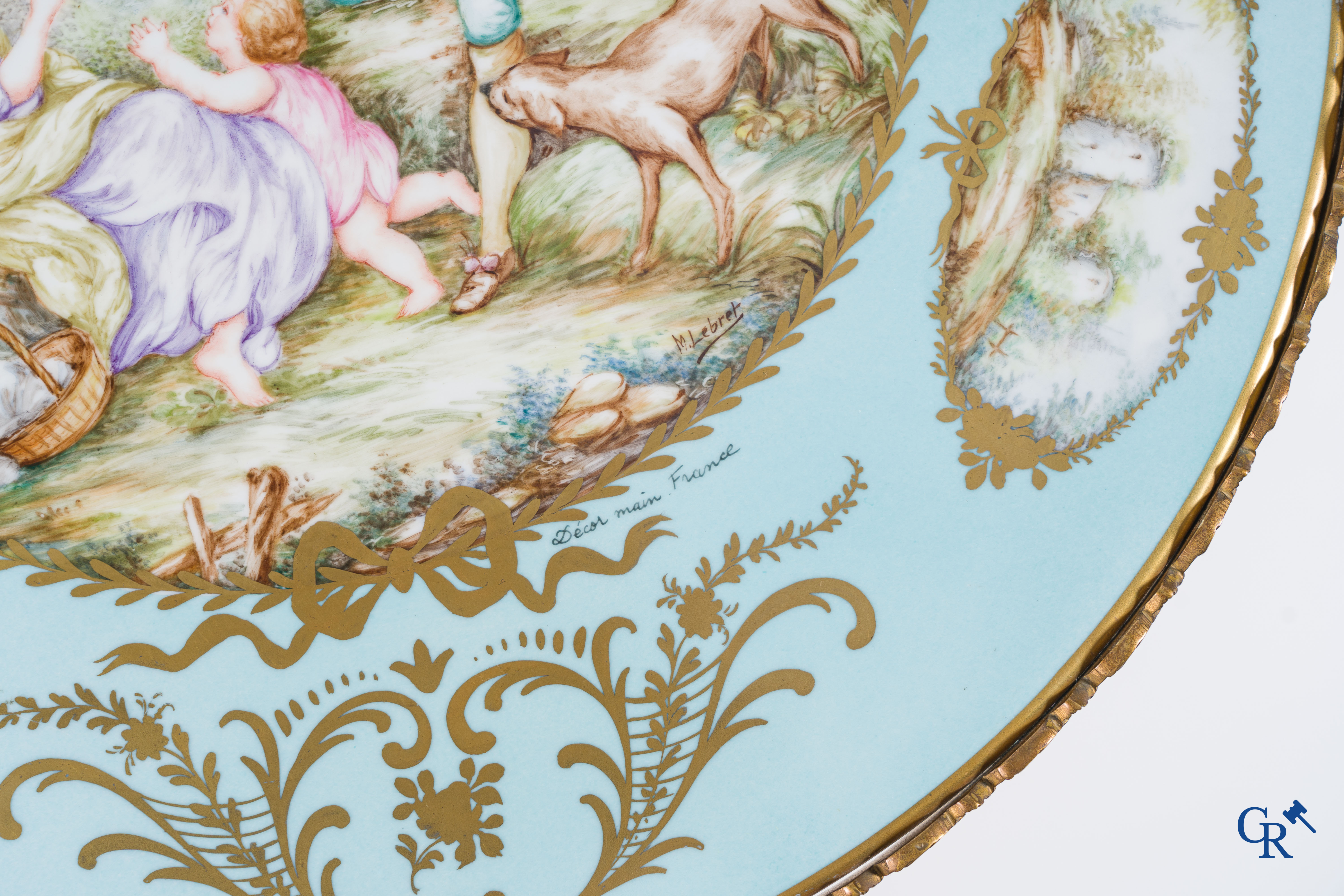 European porcelain: Limoges in the manner of Sèvres. Round coffee table in bronze and porcelain signed M. Lebret.