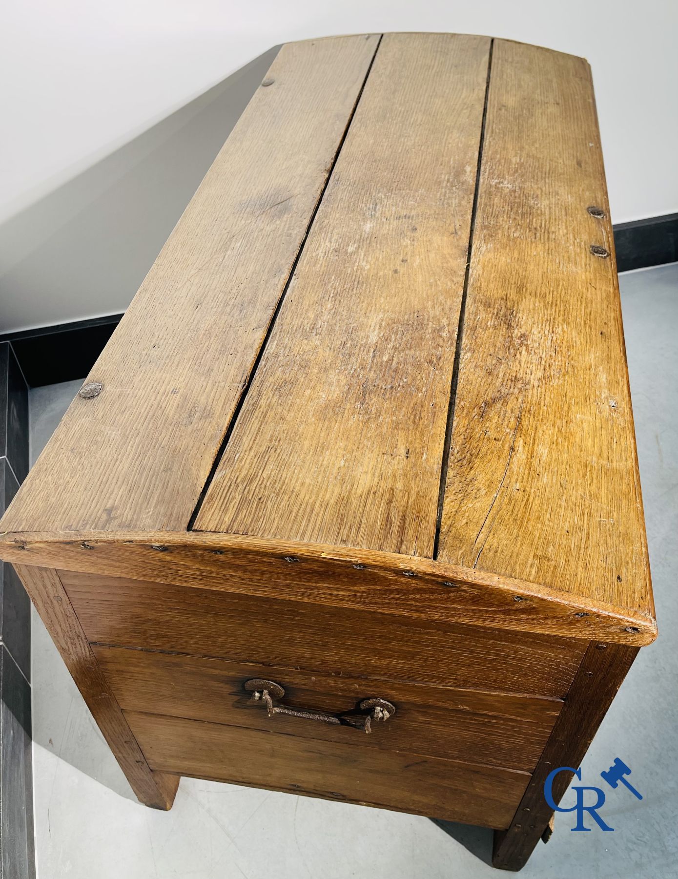 2 oak chests and an antique cast iron fireplace plate.