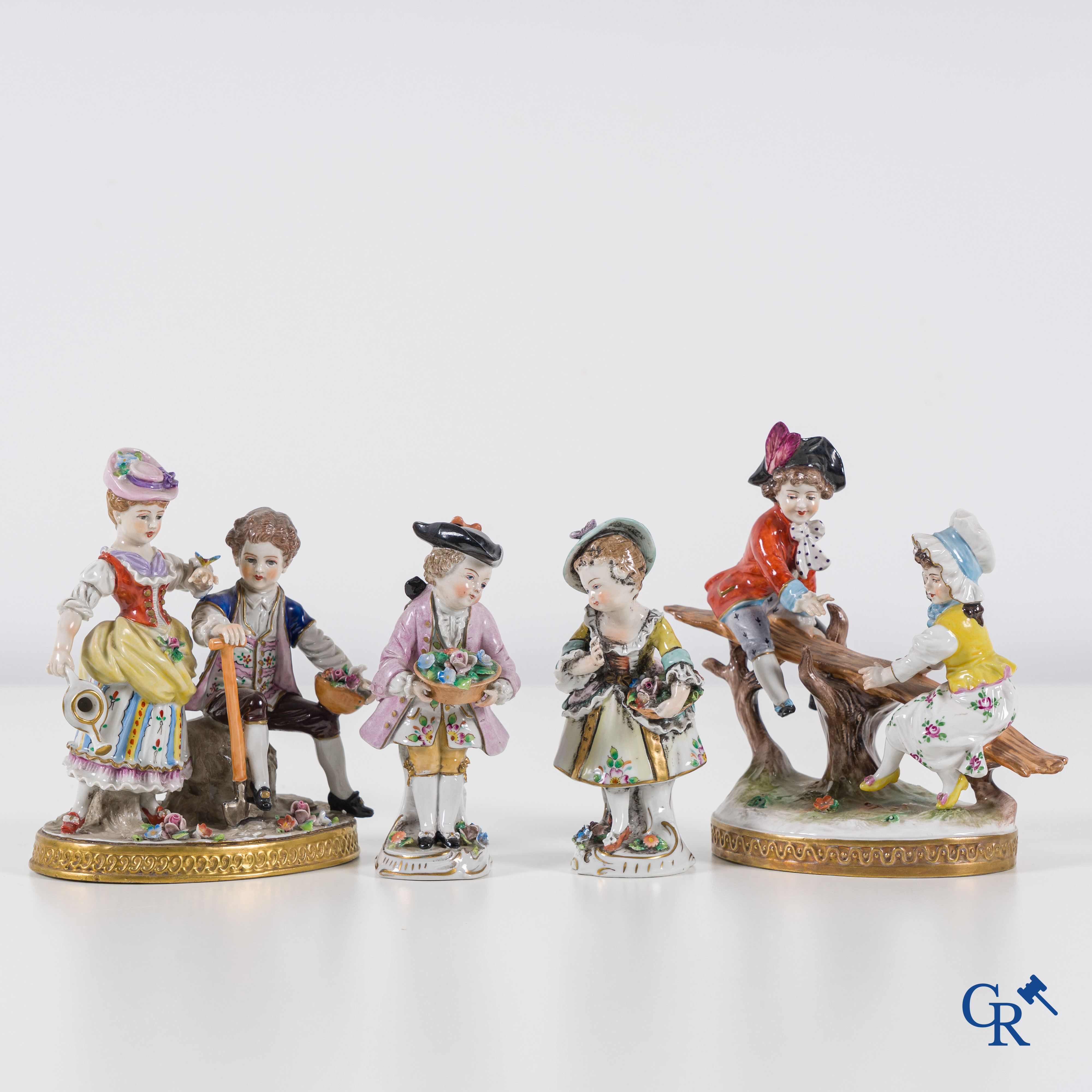 European porcelain: Volkstedt Rudolstadt and Sitzendorf porcelain. 4 groups in multi-coloured finely decorated porcelain.