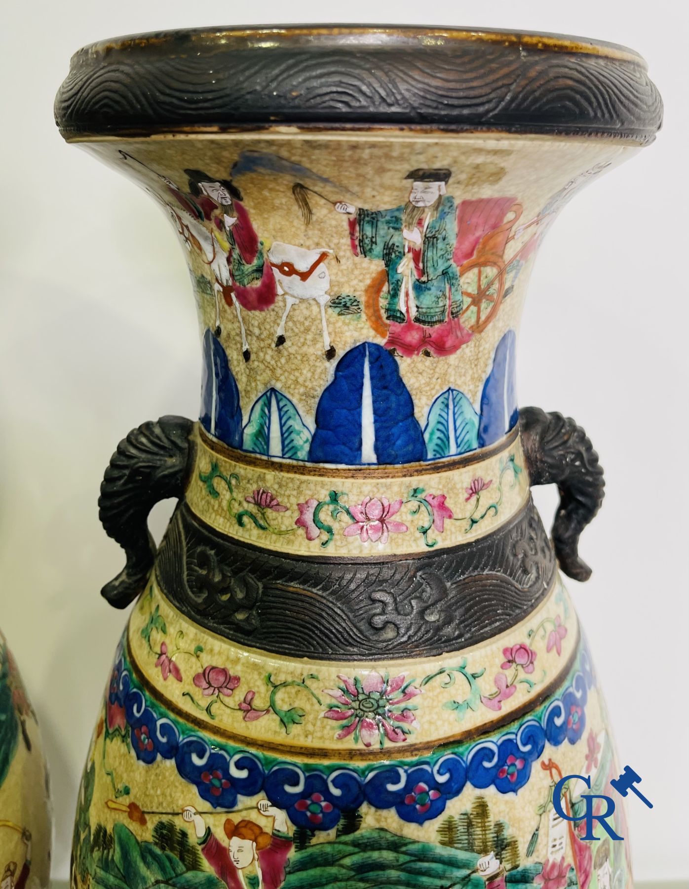 Asian Art: A pair of Chinese Nanking vases with famille rose decor.