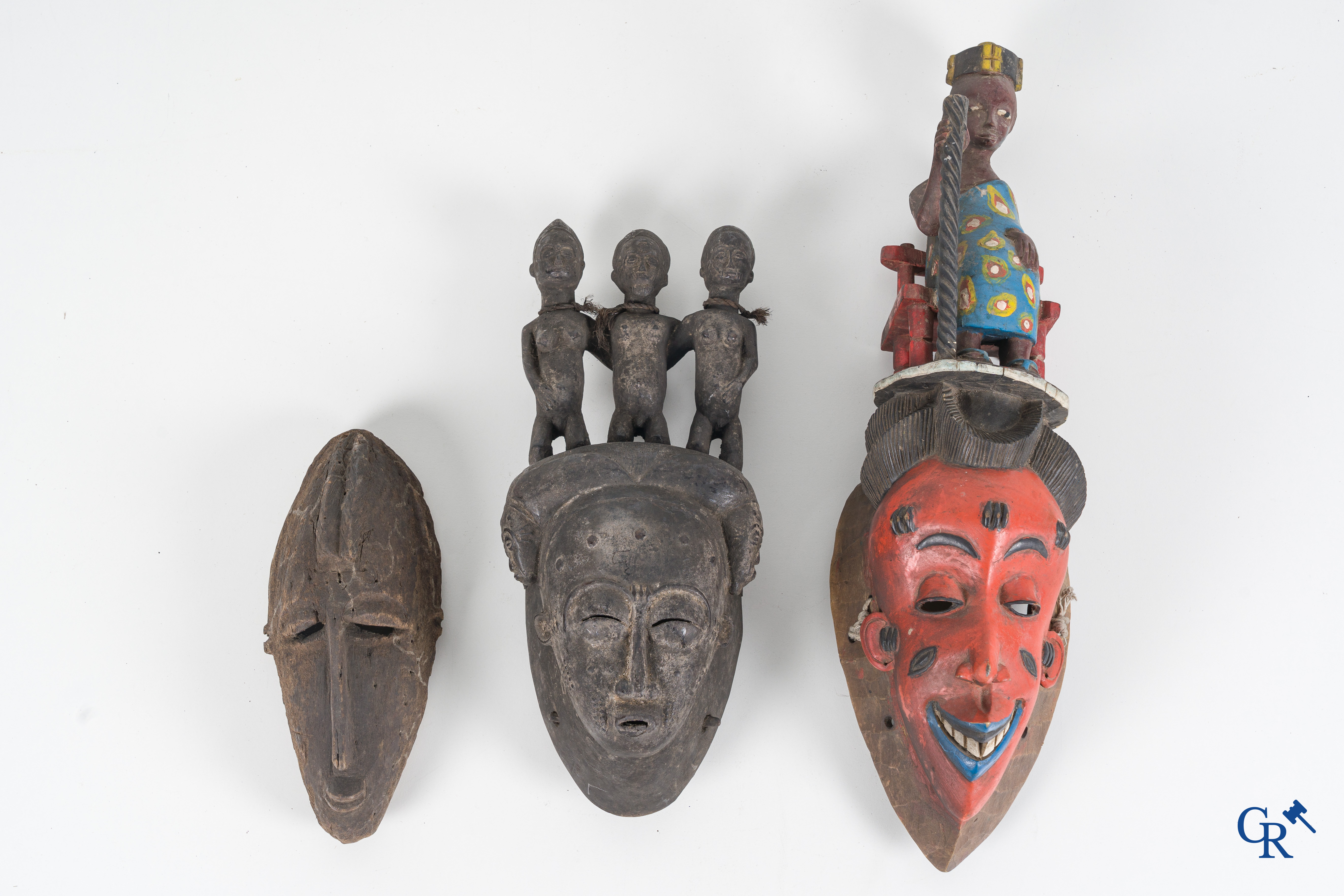 Tribal art, Primitive art. A lot with African objects, masks, bronze slave band, necklace and others.