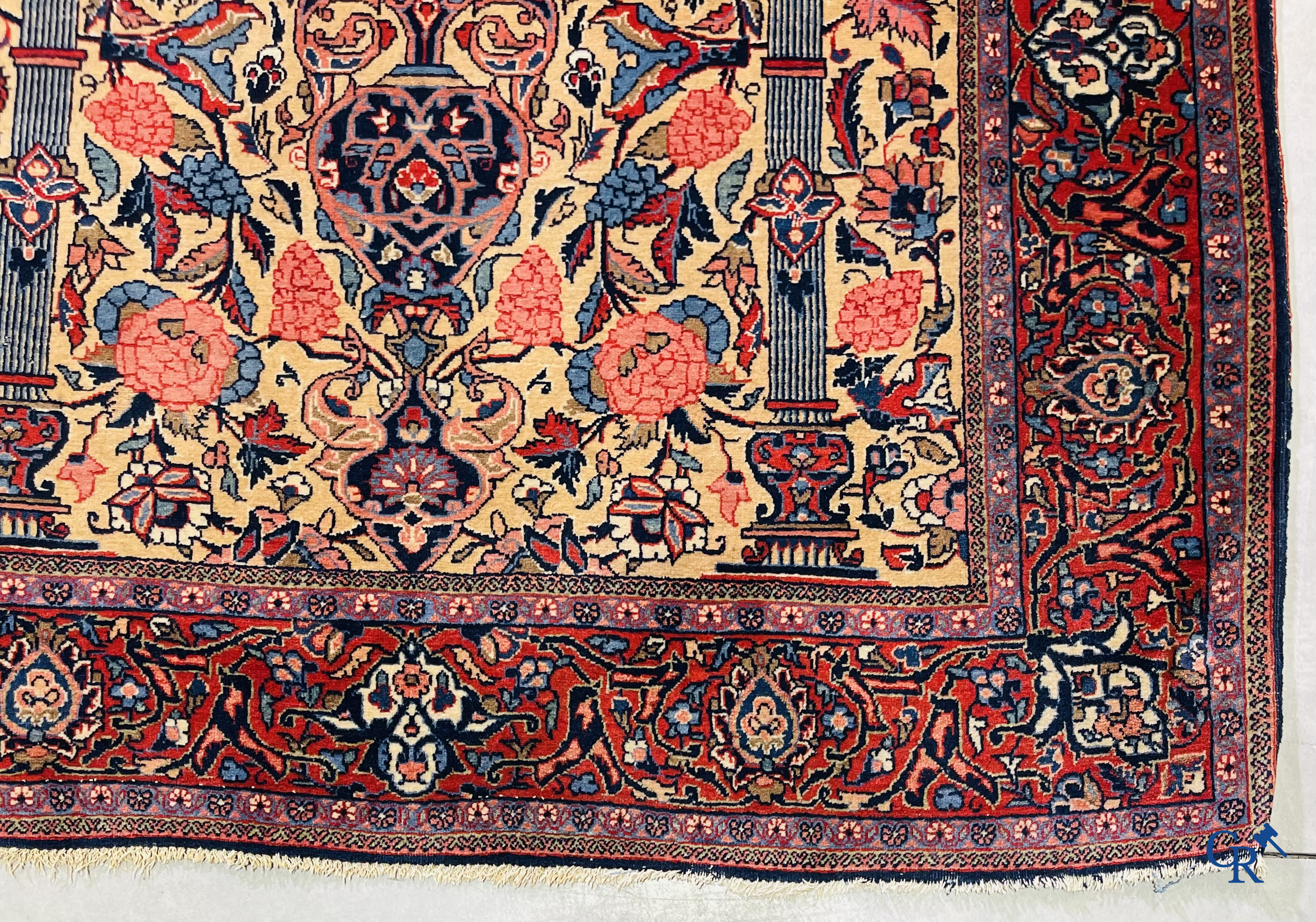 Oriental carpets: Iran. 2 antique hand-knotted Persian carpets with floral decor.