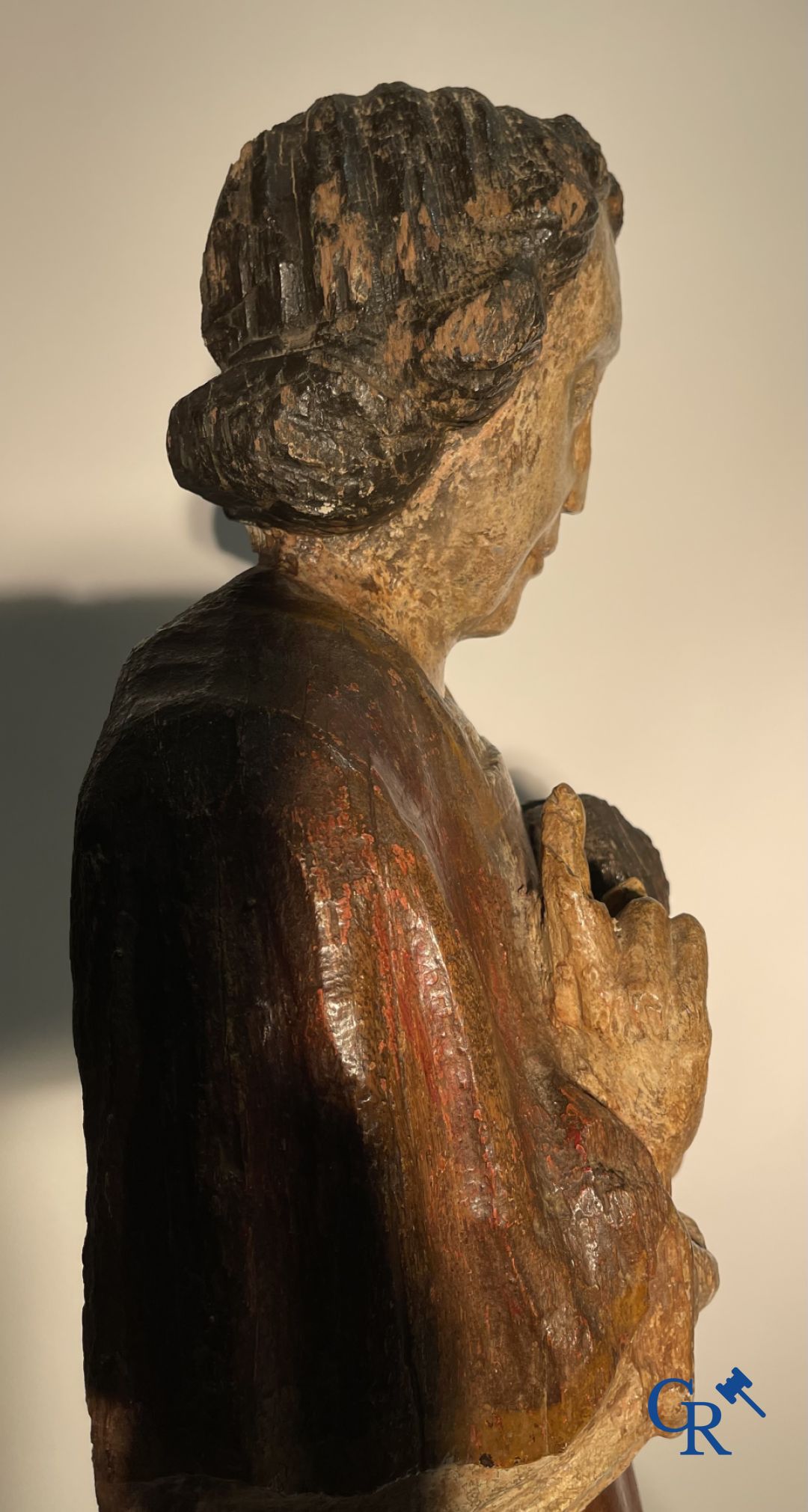 Wooden sculpture: Polychrome wood sculpture of a saint. Saint Stephen. Probably 17th century.