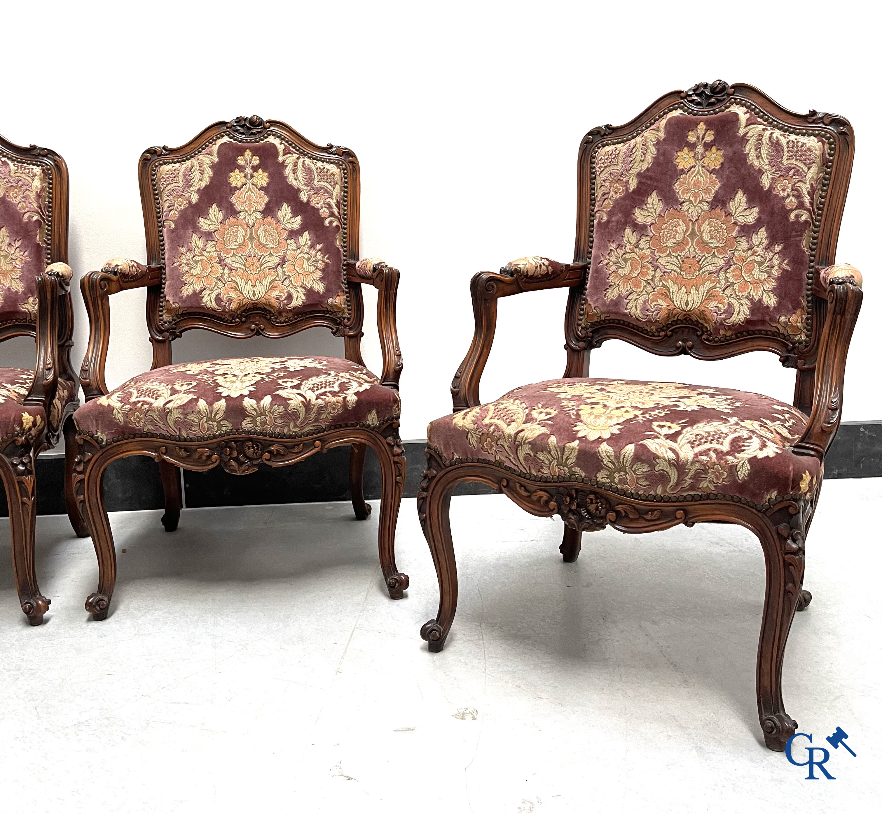 A set of 4 carved wood LXV-style armchairs.