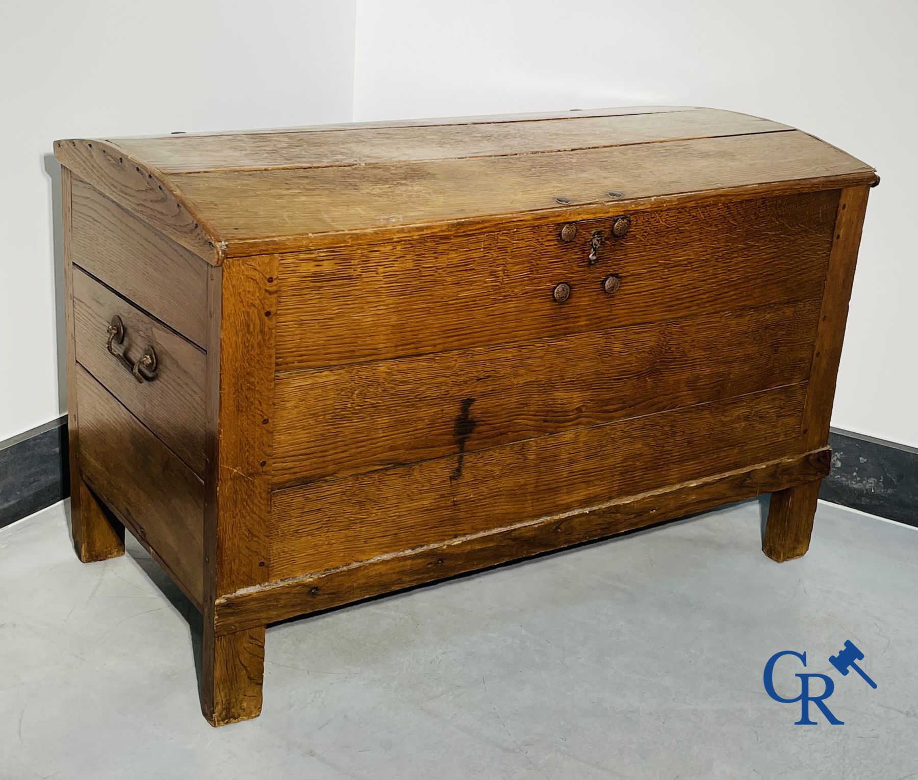 2 oak chests and an antique cast iron fireplace plate.