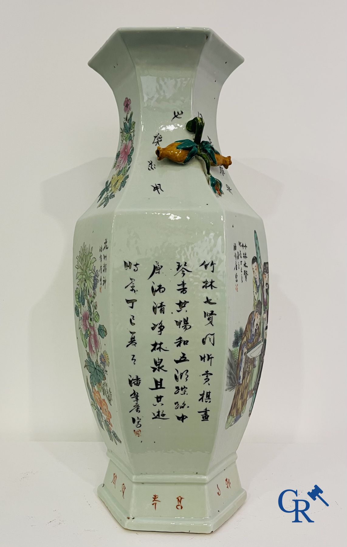 Asian Art: Chinese porcelain. A hexagonal Chinese Famille rose vase with sages and scholars. 19/20th century.