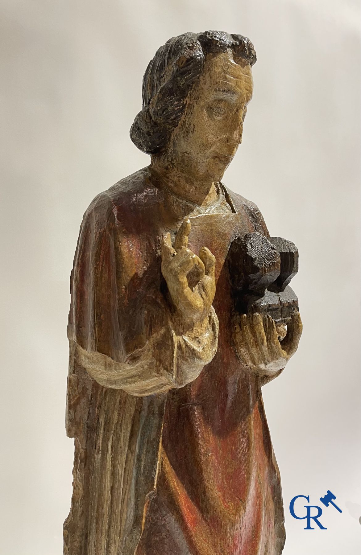 Wooden sculpture: Polychrome wood sculpture of a saint. Saint Stephen. Probably 17th century.