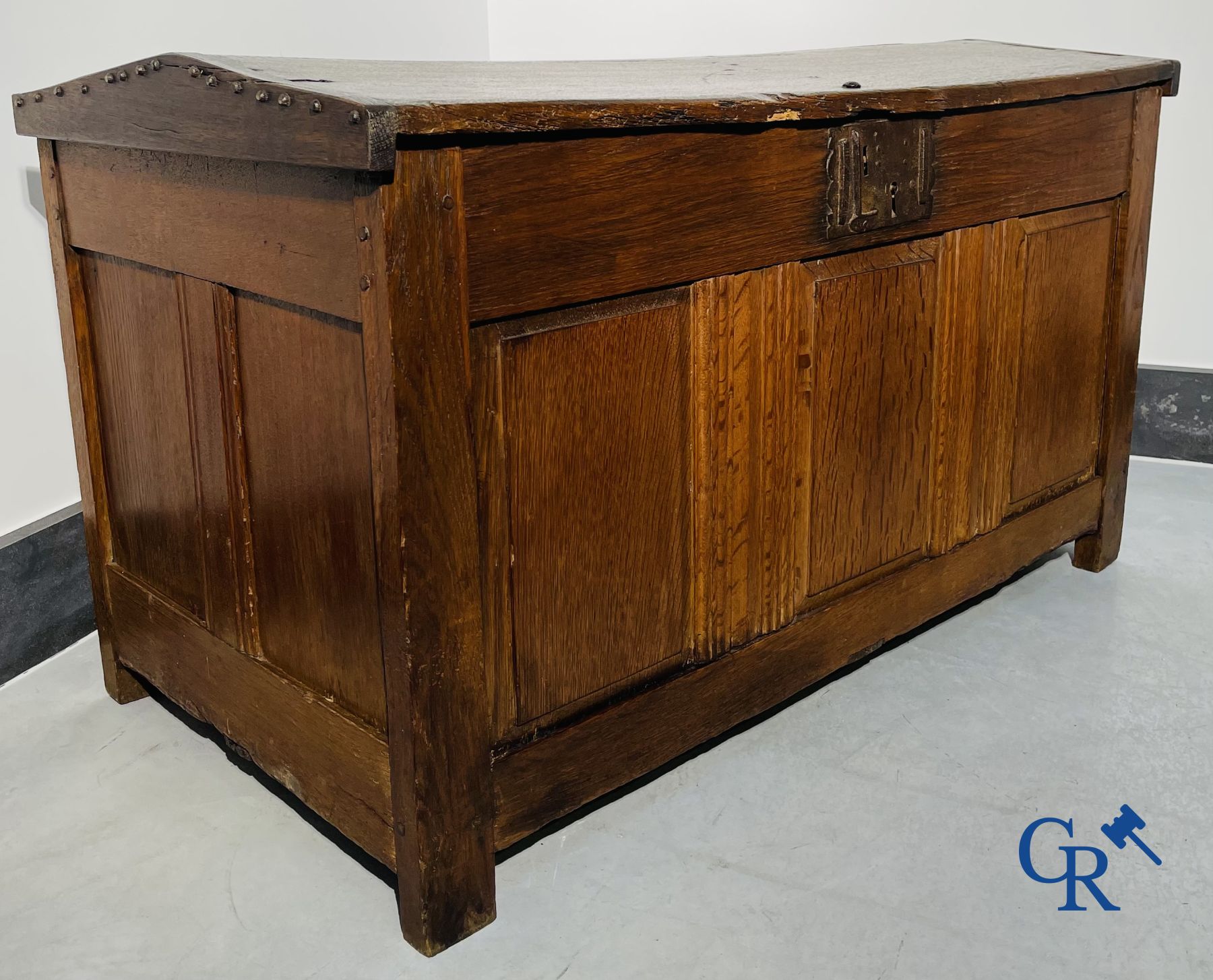 2 oak chests and an antique cast iron fireplace plate.