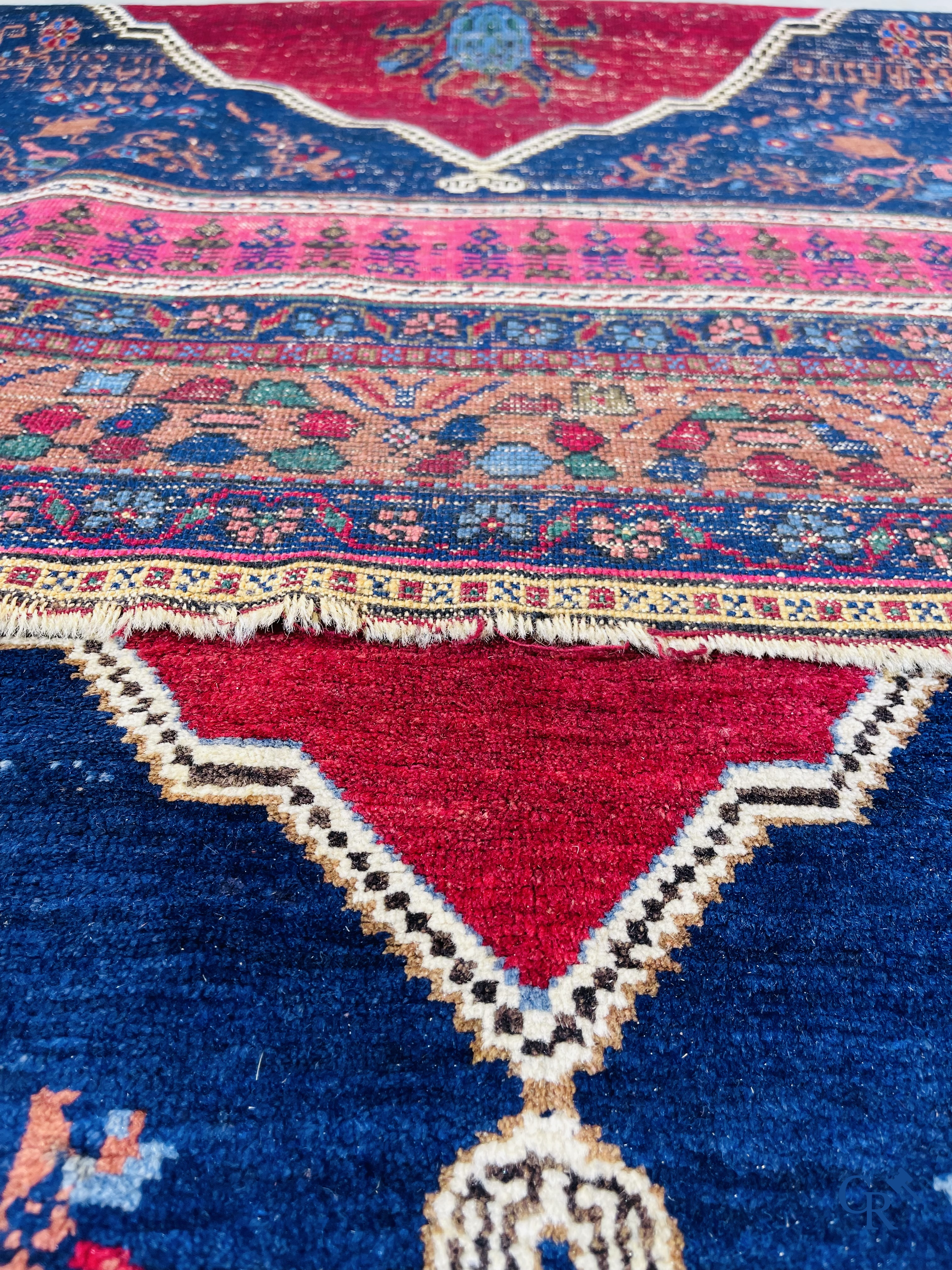 Oriental carpets, 2 antique hand-knotted Oriental carpets.