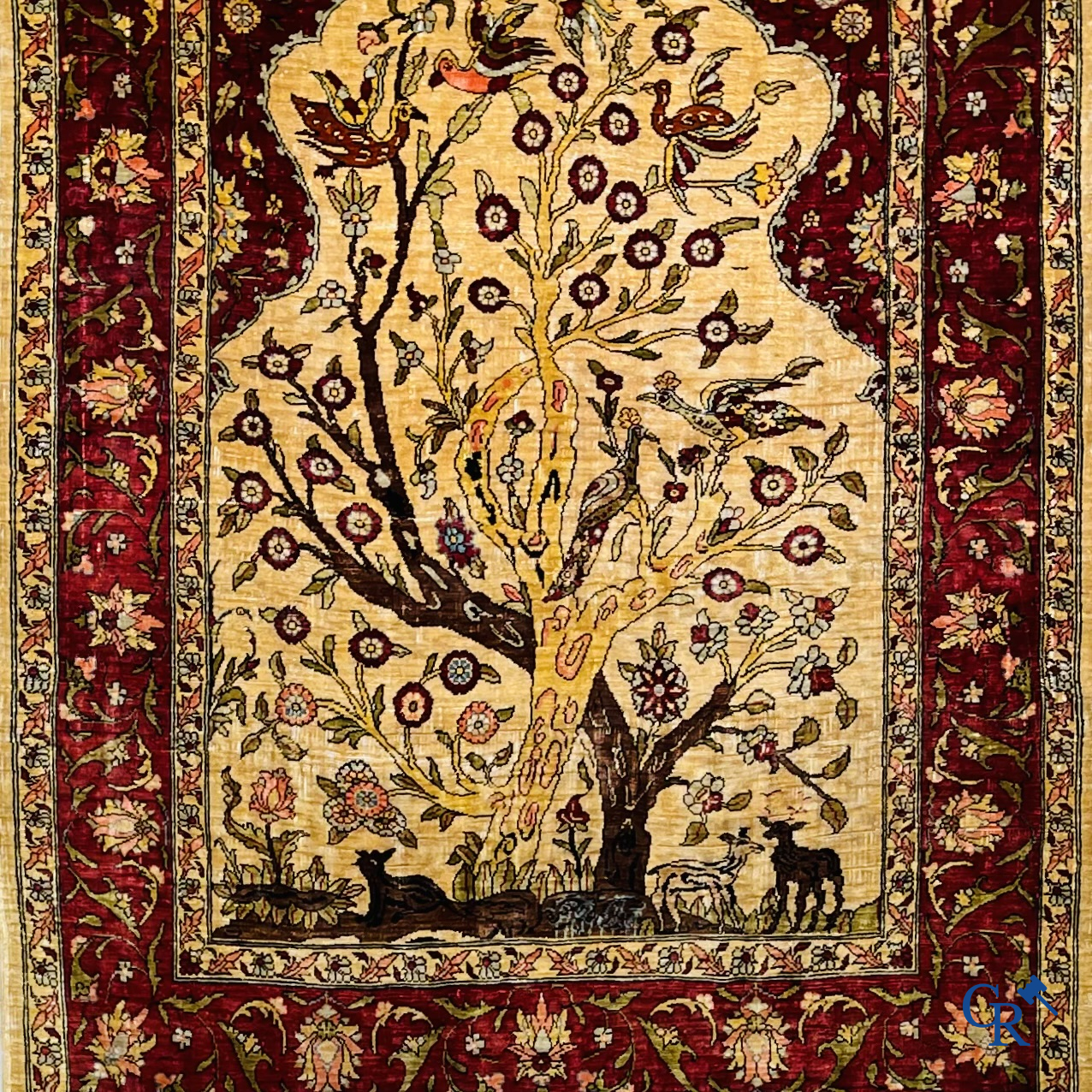 Oriental carpets, Hereke, a finely hand-knotted and signed silk carpet with a tree of life.