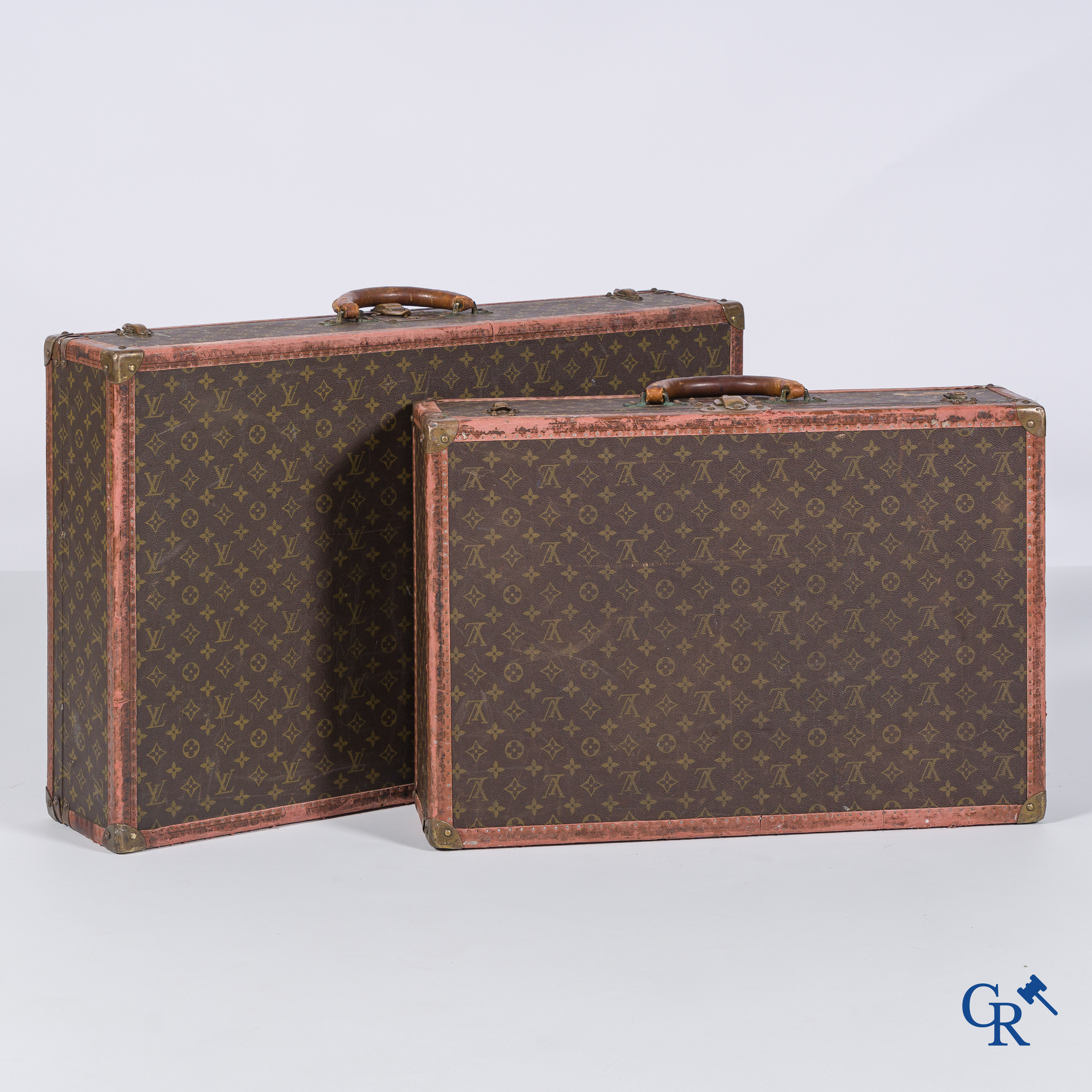 Louis Vuitton, 2 suitcases of which 1 with a label Av. Marceau 78 bis Paris and numbered 982010.