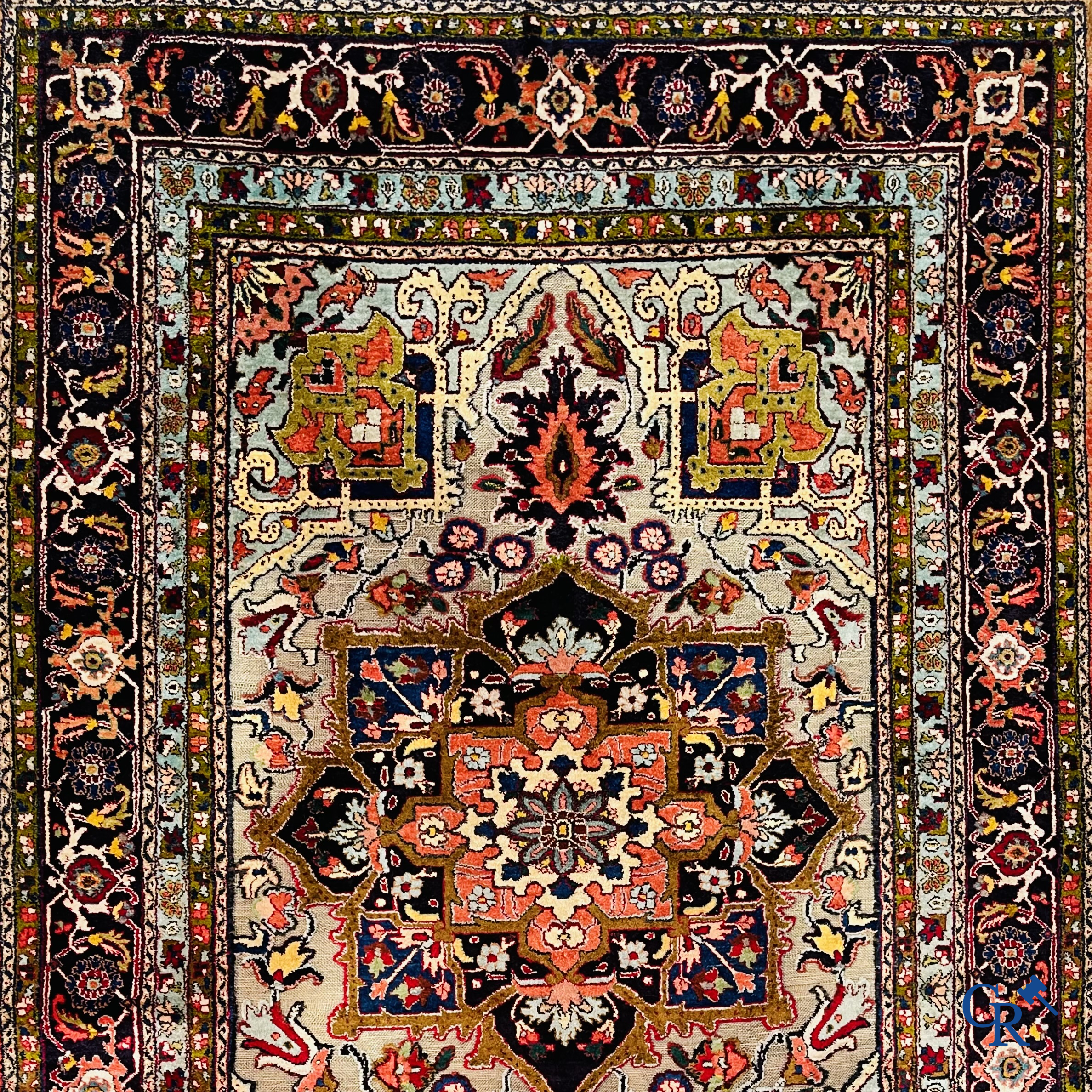 Oriental carpets: Heriz, an exceptionally finely knotted carpet decorated with silver thread.