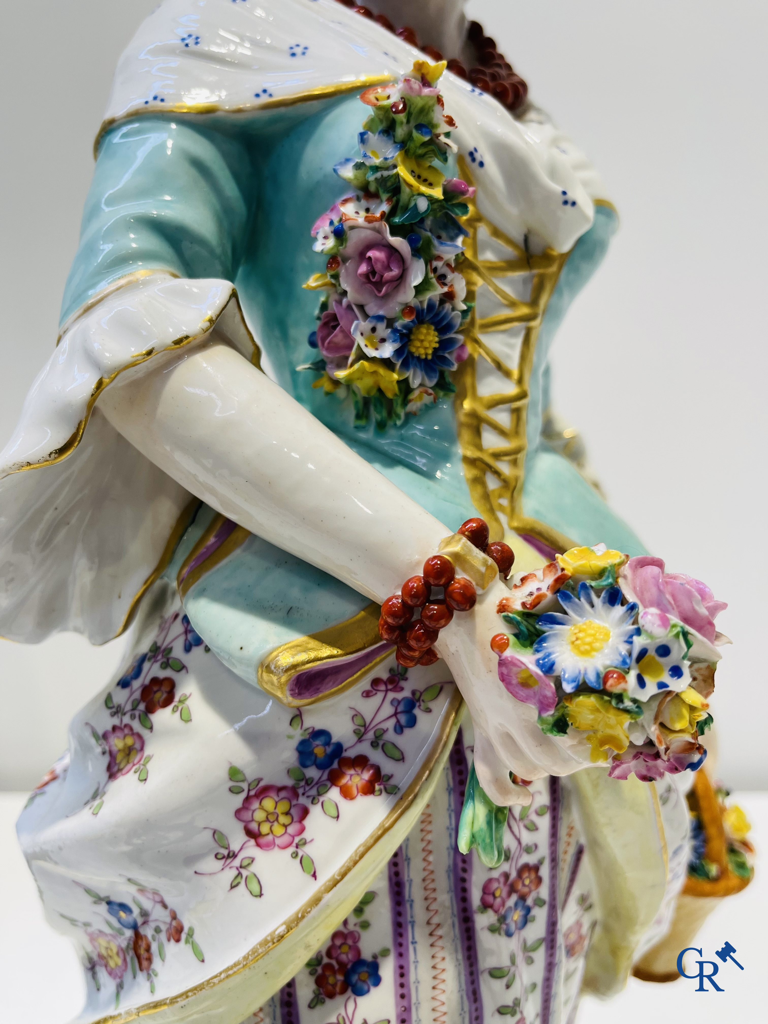 Exceptionally large pair of romantic statues in coloured and gilded porcelain in the manner of Meissen.