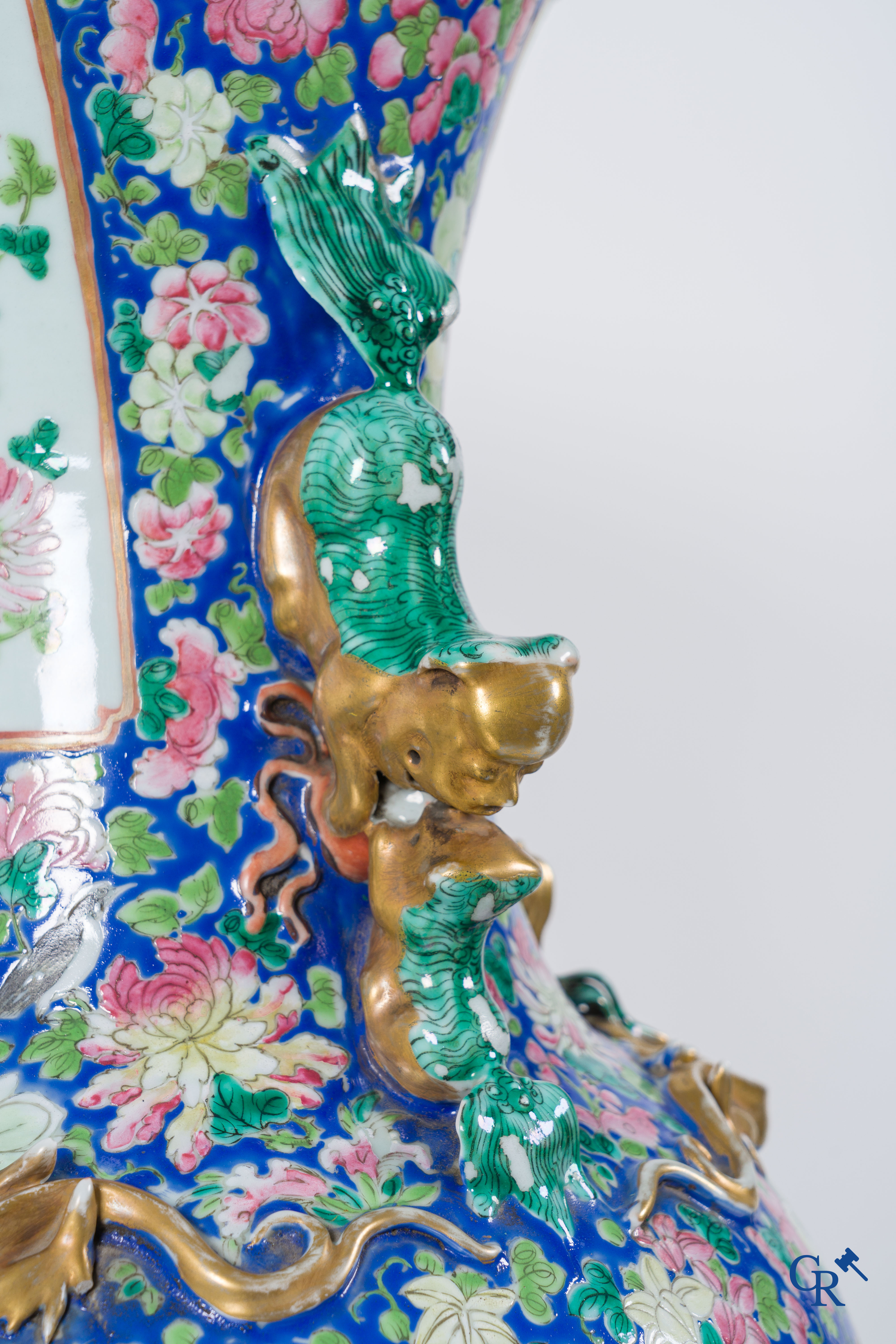 Asian Art: Chinese porcelain. A pair of imposing Chinese vases with famille rose decor. China 19th century.