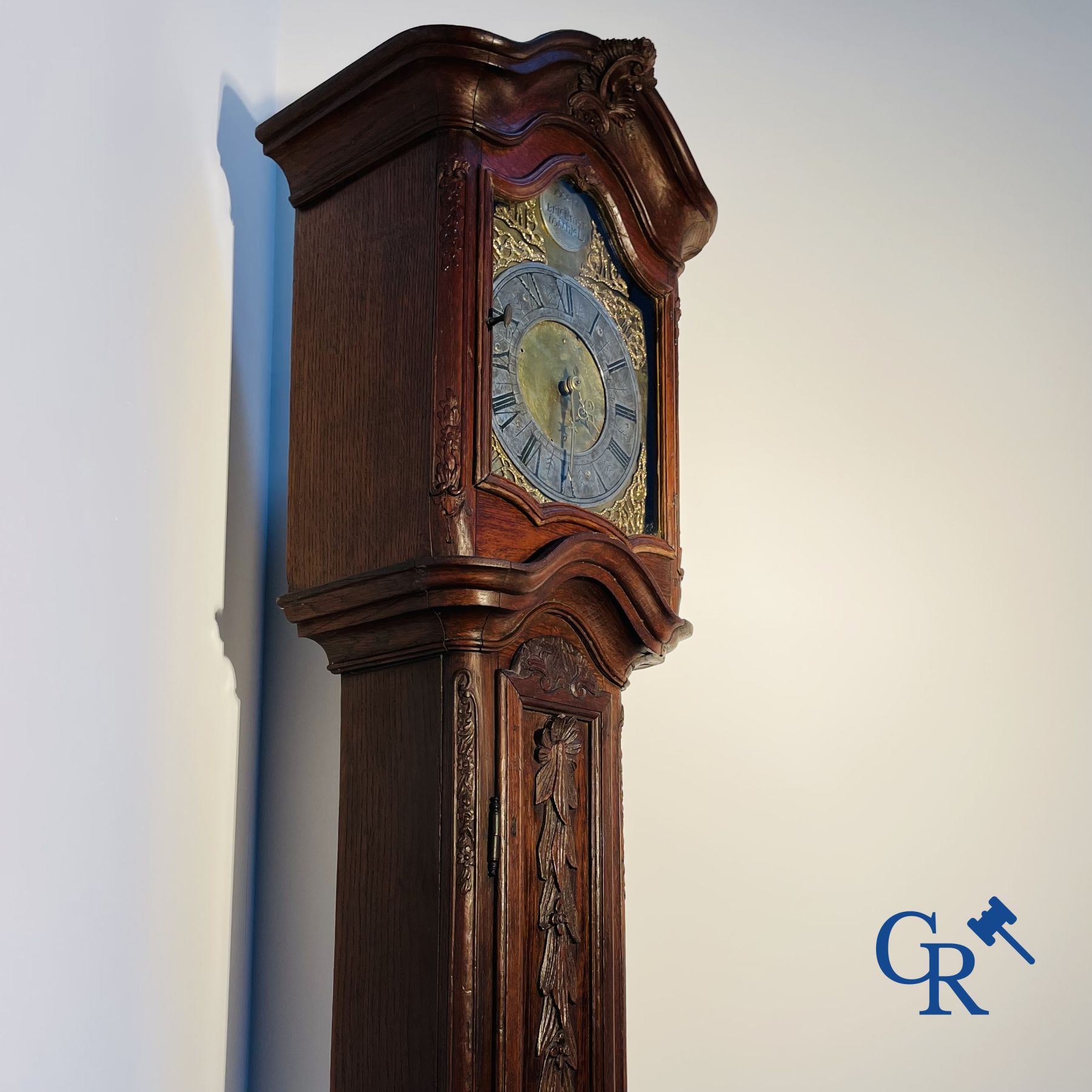 Standing clock in oak. 18th century.