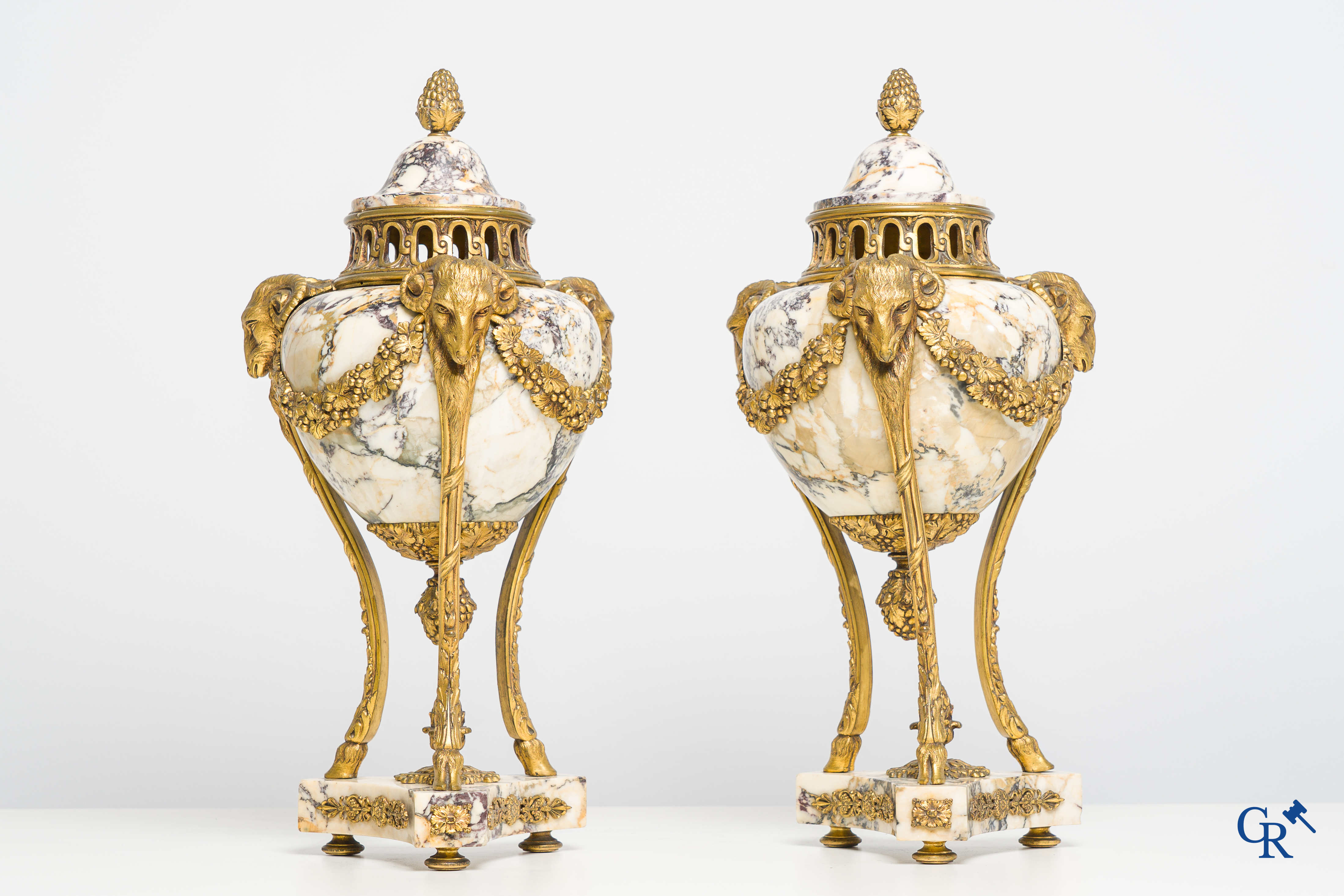 Pair of cassolettes in marble brèche violette with finely decorated and gilded bronze frames. Louis XVI style. 