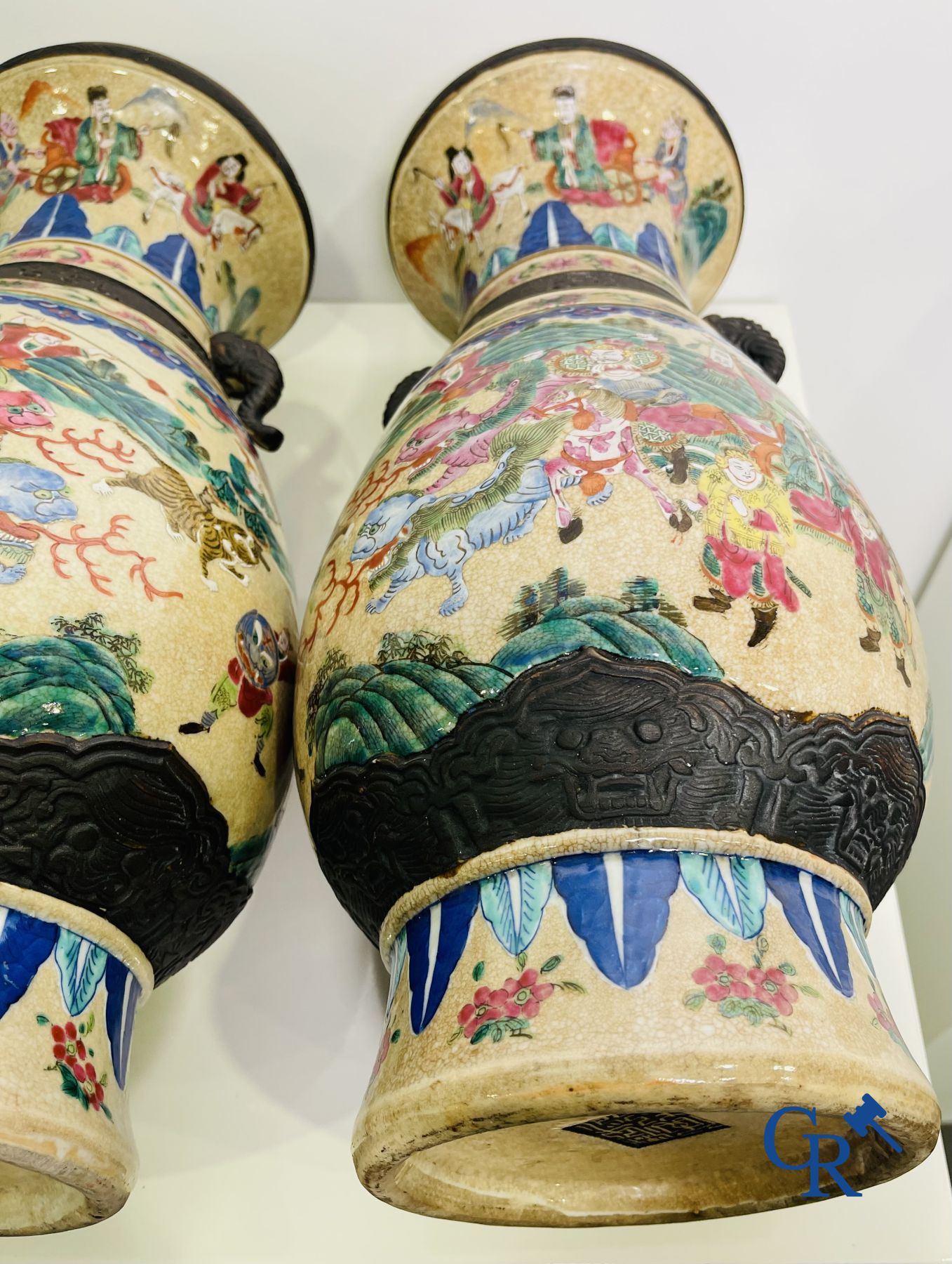 Asian Art: A pair of Chinese Nanking vases with famille rose decor.