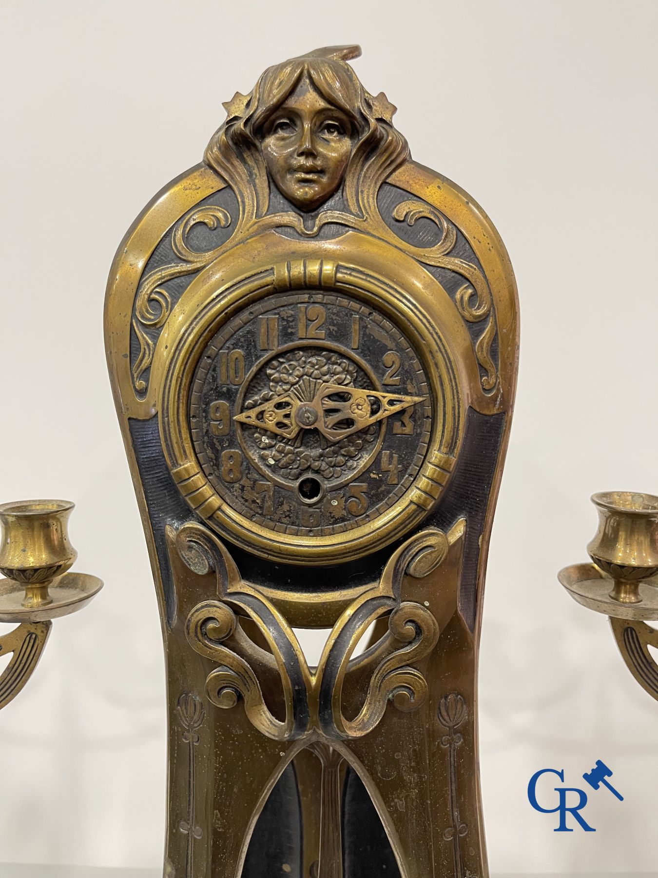 Art Nouveau: Exceptional bronze clock set in Art Nouveau.