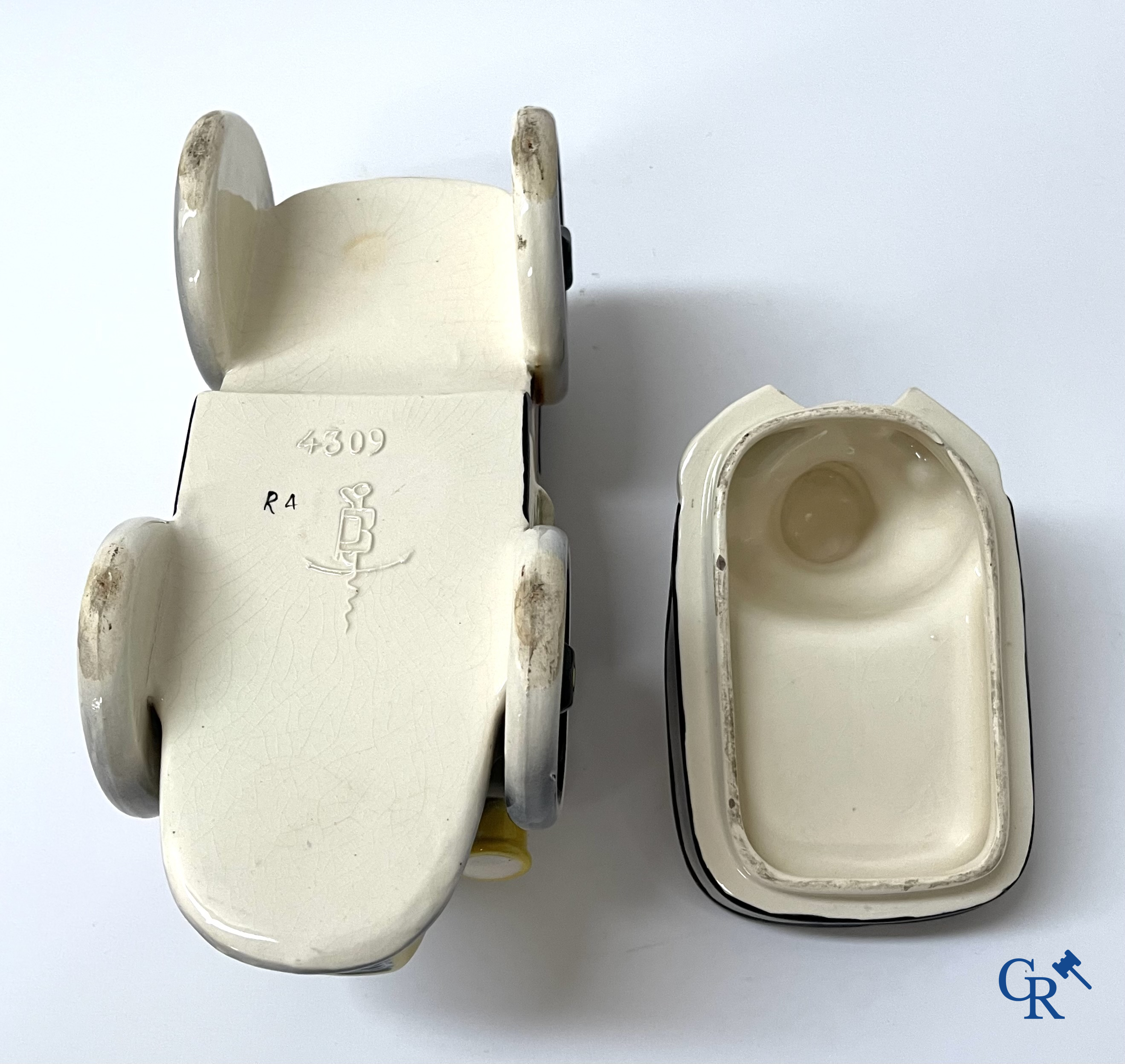 Faïencerie Fives Lille. L'Automobiliste, een grote tabakspot in de vorm van een automobilist. Circa 1910.