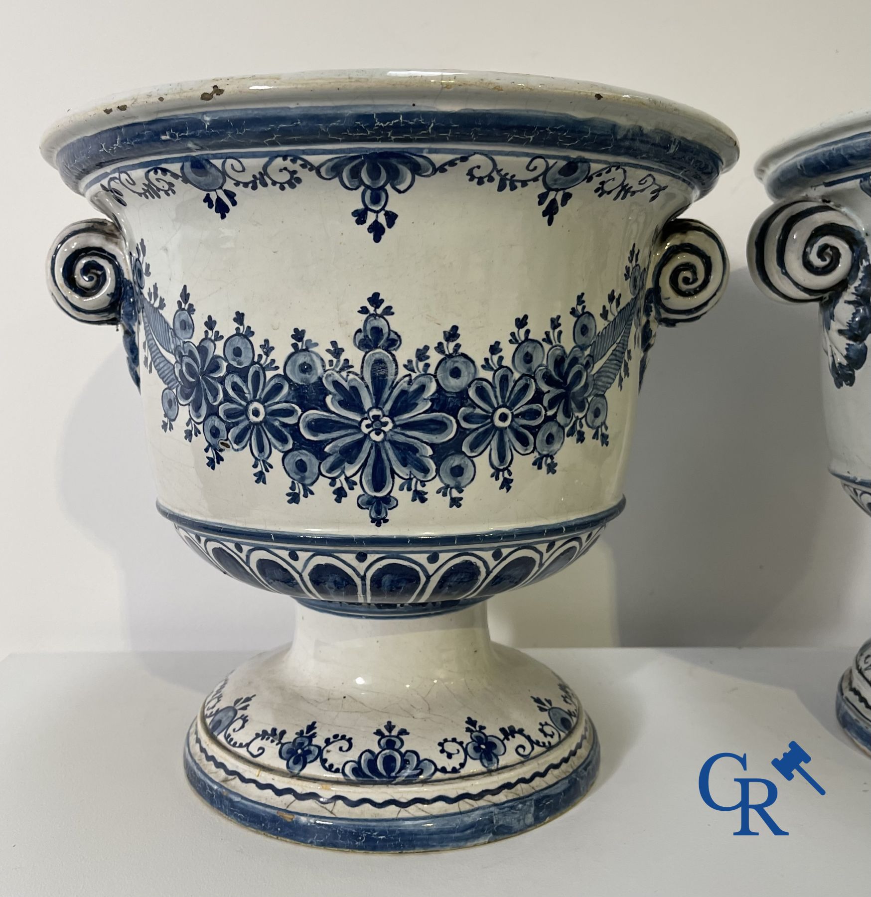 Delft: 11 pieces of blue and white faience with different décors. 17th - 18th century.