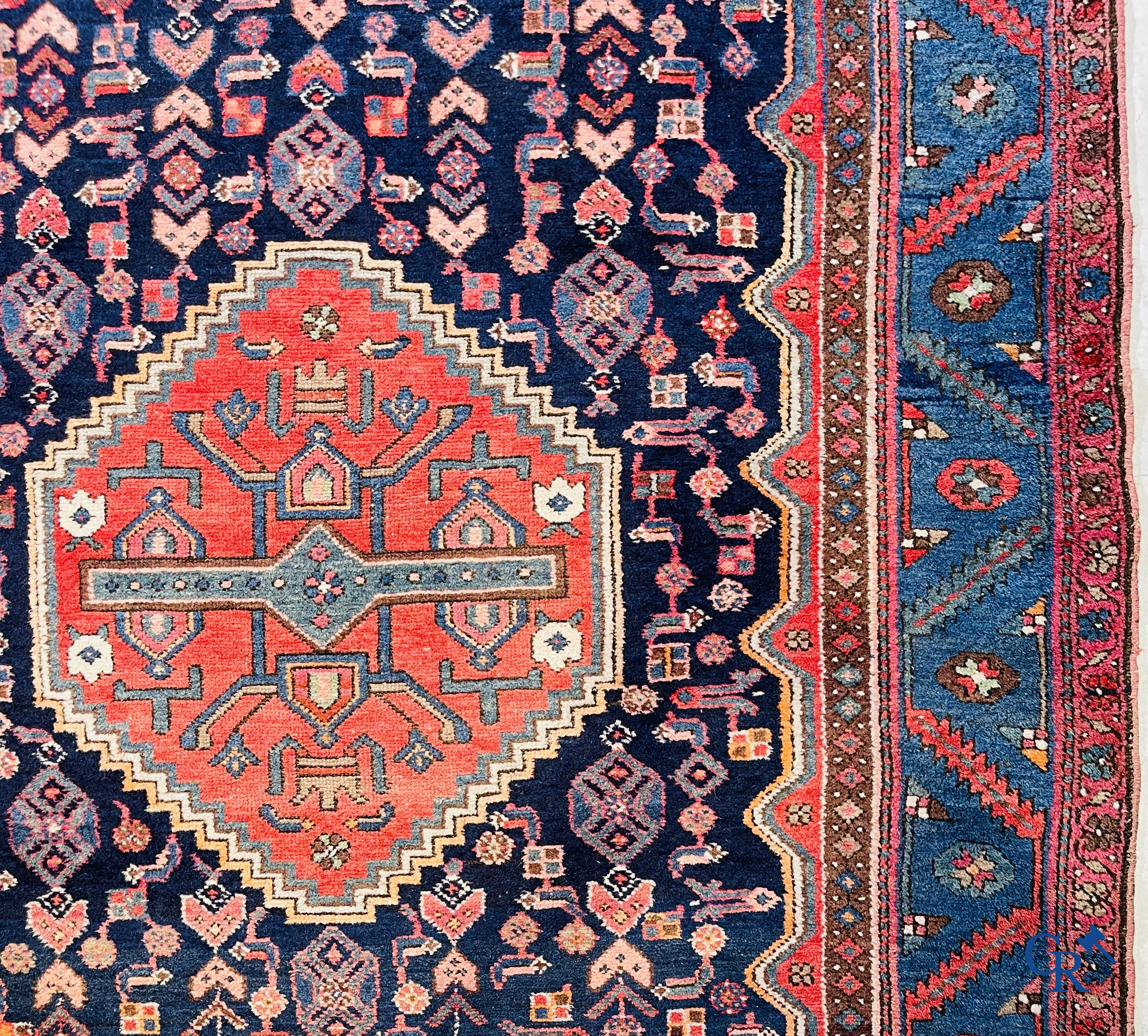 Oriental carpets, 2 antique hand-knotted Oriental carpets.