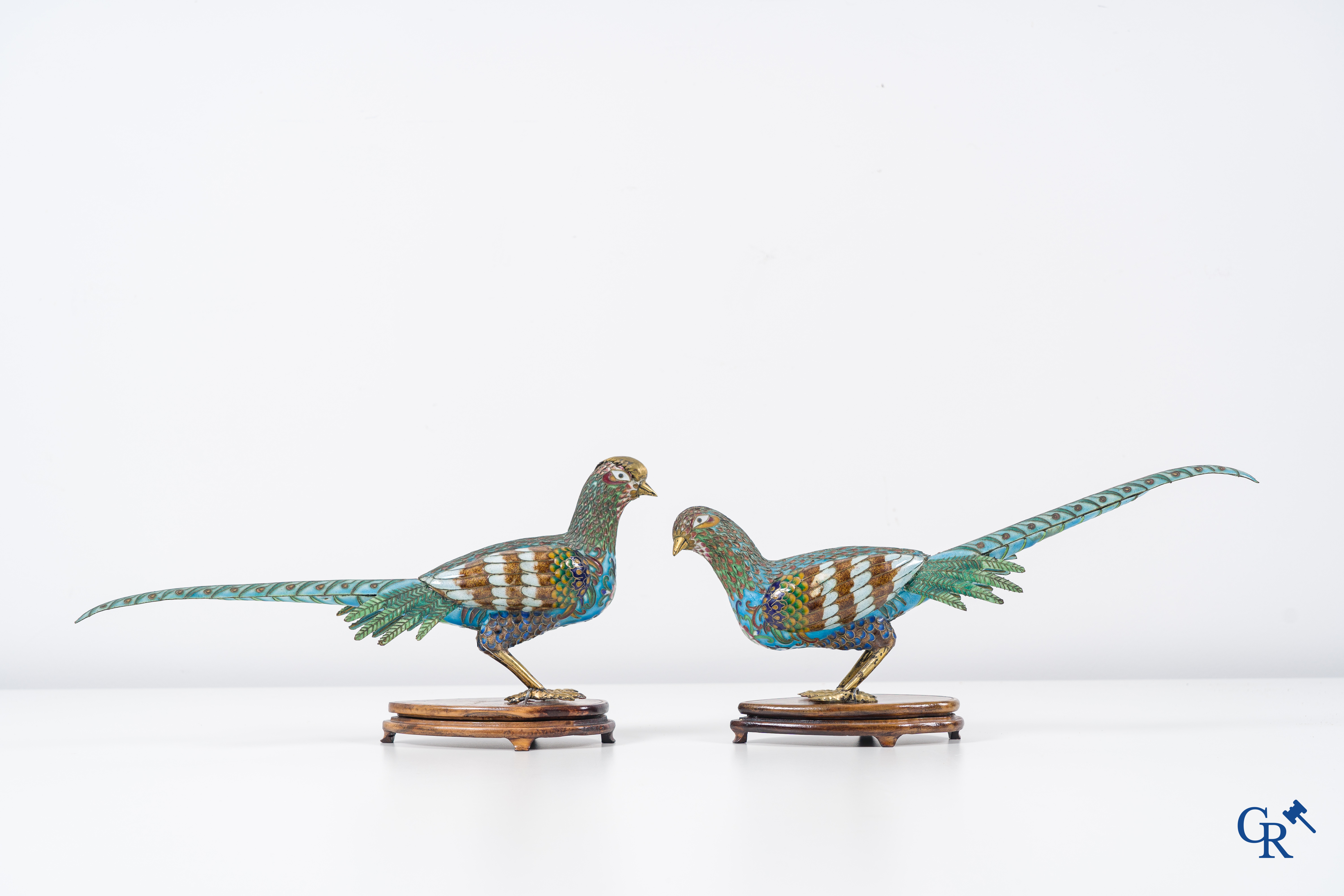 Asian Art: Chinese cloisonné. A pair of pheasants in finely crafted cloisonné. 20th century.