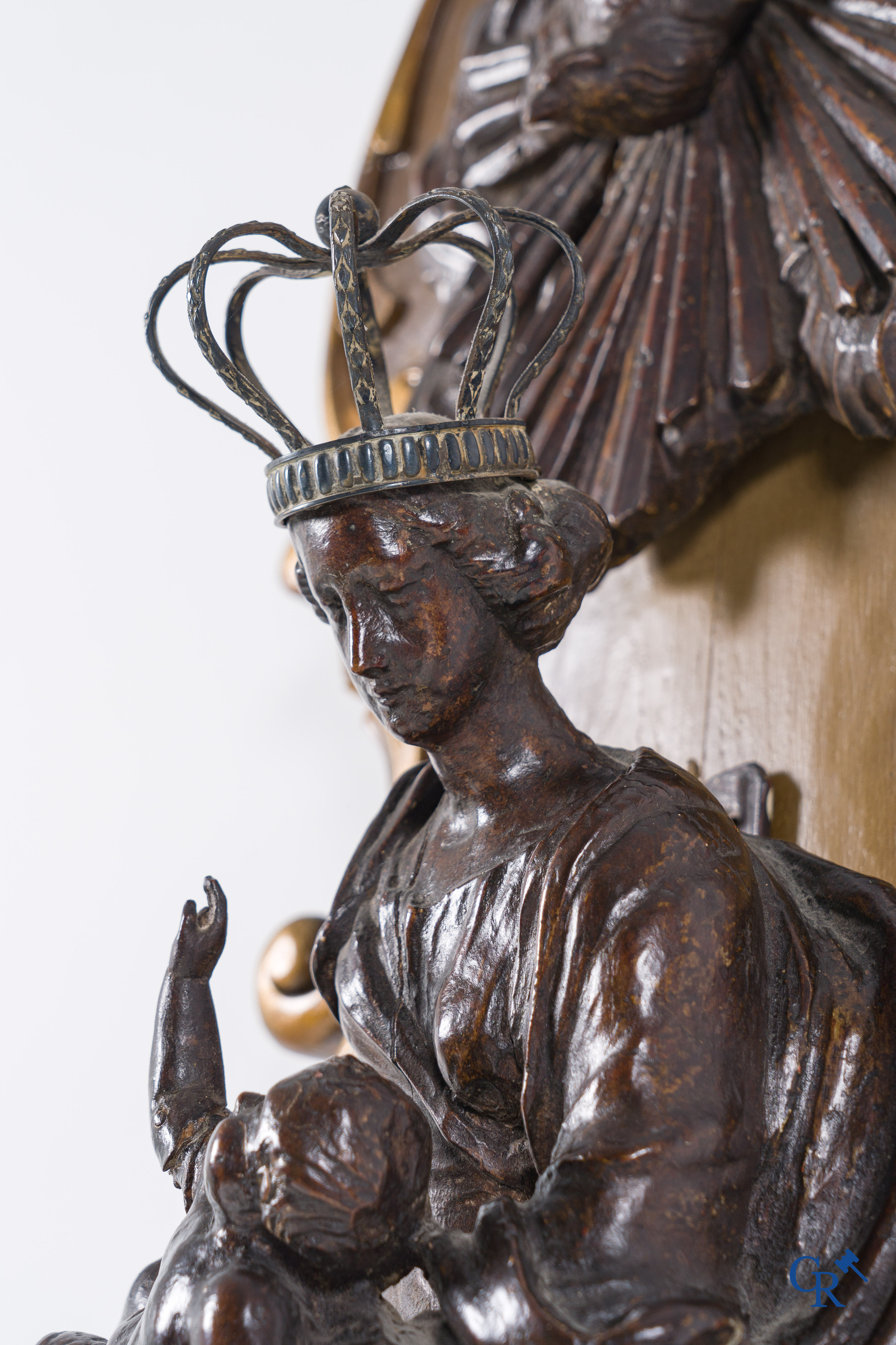 Imposing wooden sculpture of Mary with child, richly sculpted with angels and a dragon. 17th-18th century.