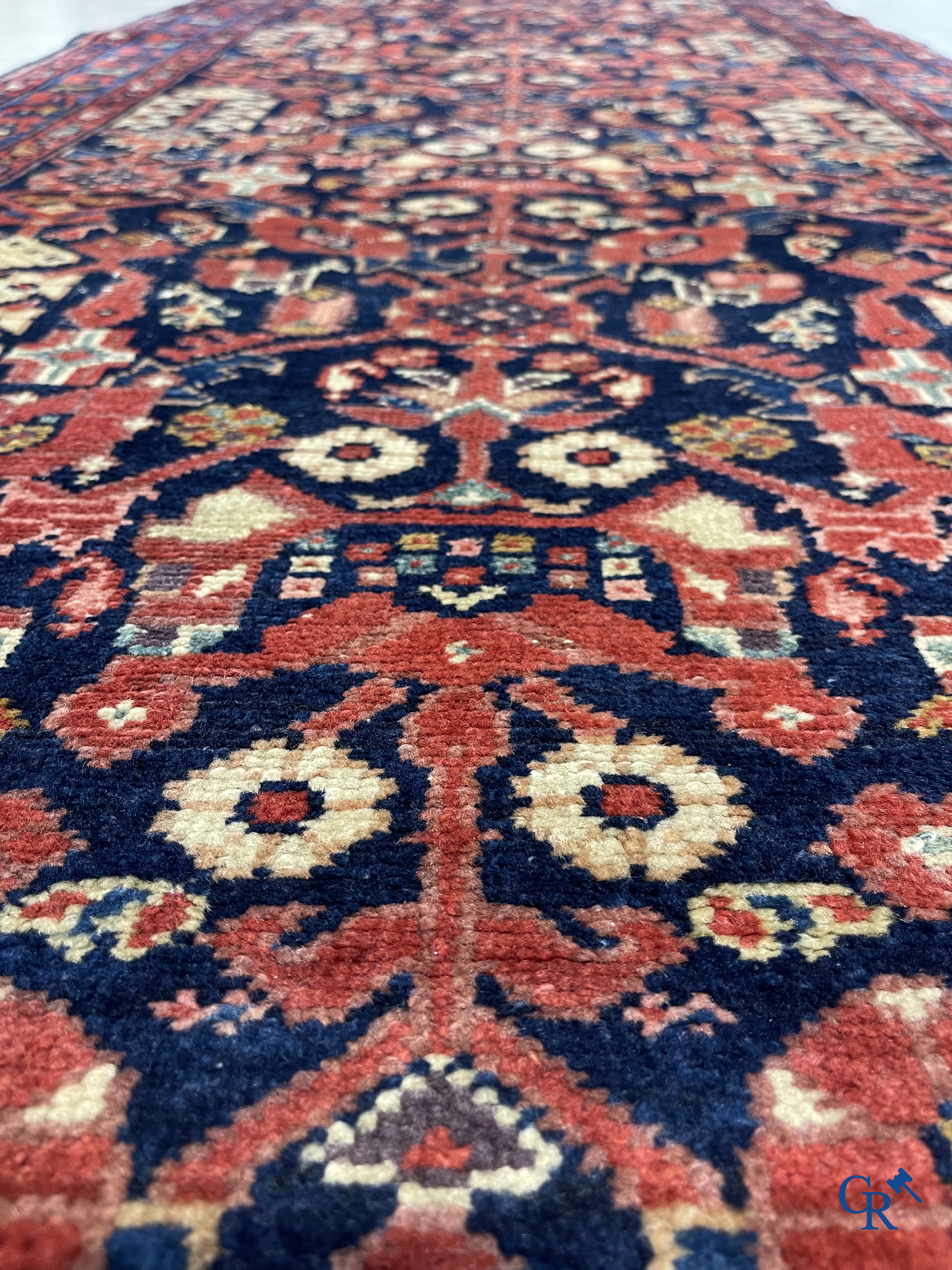 Oriental carpets: Antique hand-knotted Oriental carpet.