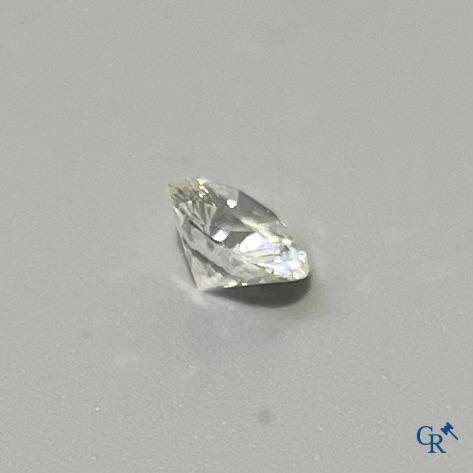 Juwelen, een niet gemonteerde briljant van ongeveer 0,80 ct.