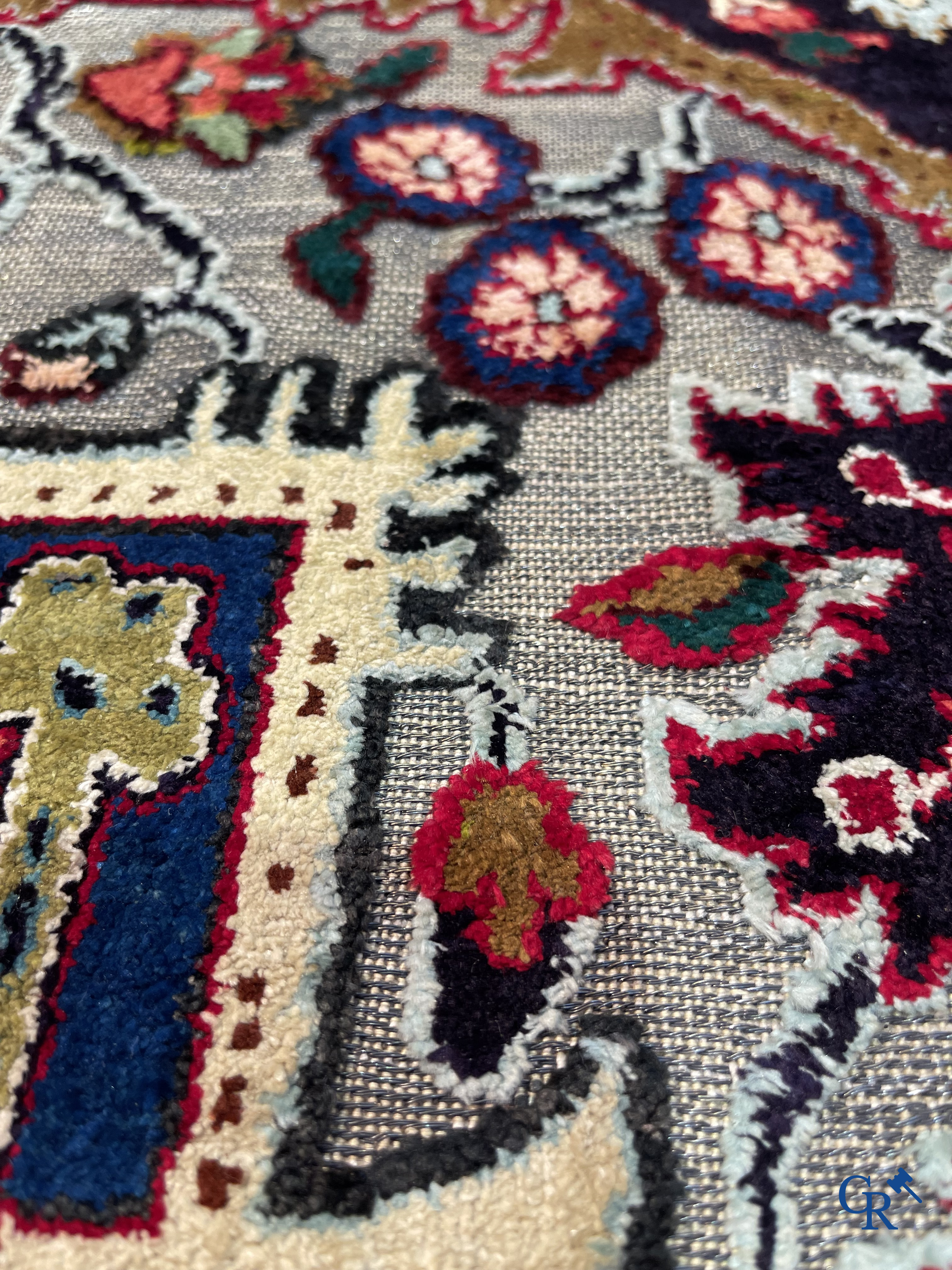 Oriental carpets: Heriz, an exceptionally finely knotted carpet decorated with silver thread.