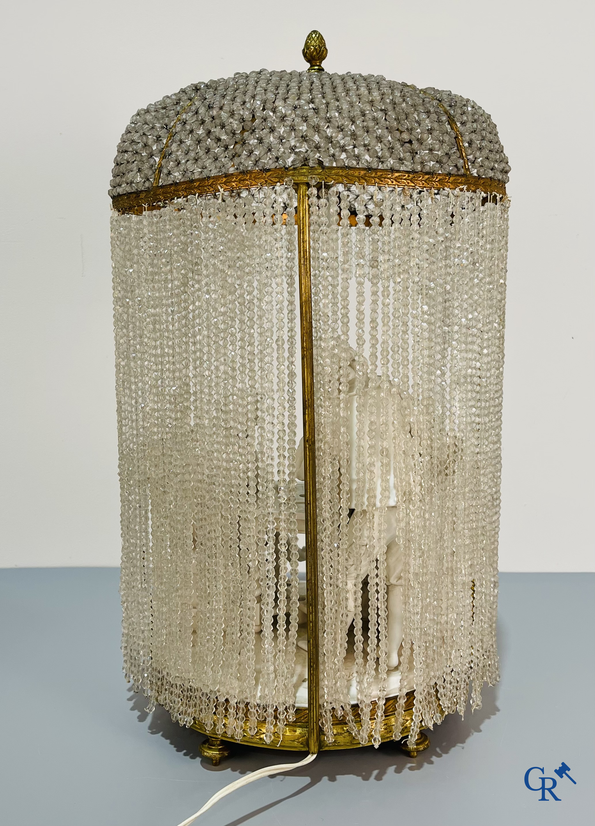 European porcelain, Karel Ens Volkstedt, a large lamp in biscuit and bronze, LXVI-style. Marked. Around 1920.