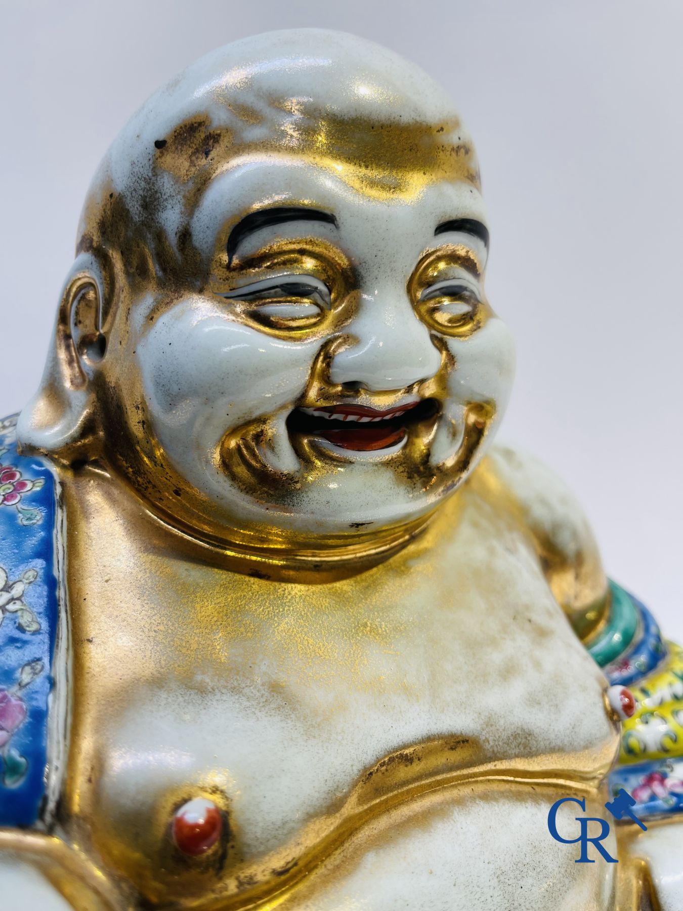 Chinese porcelain: Tall figure of Buddha.