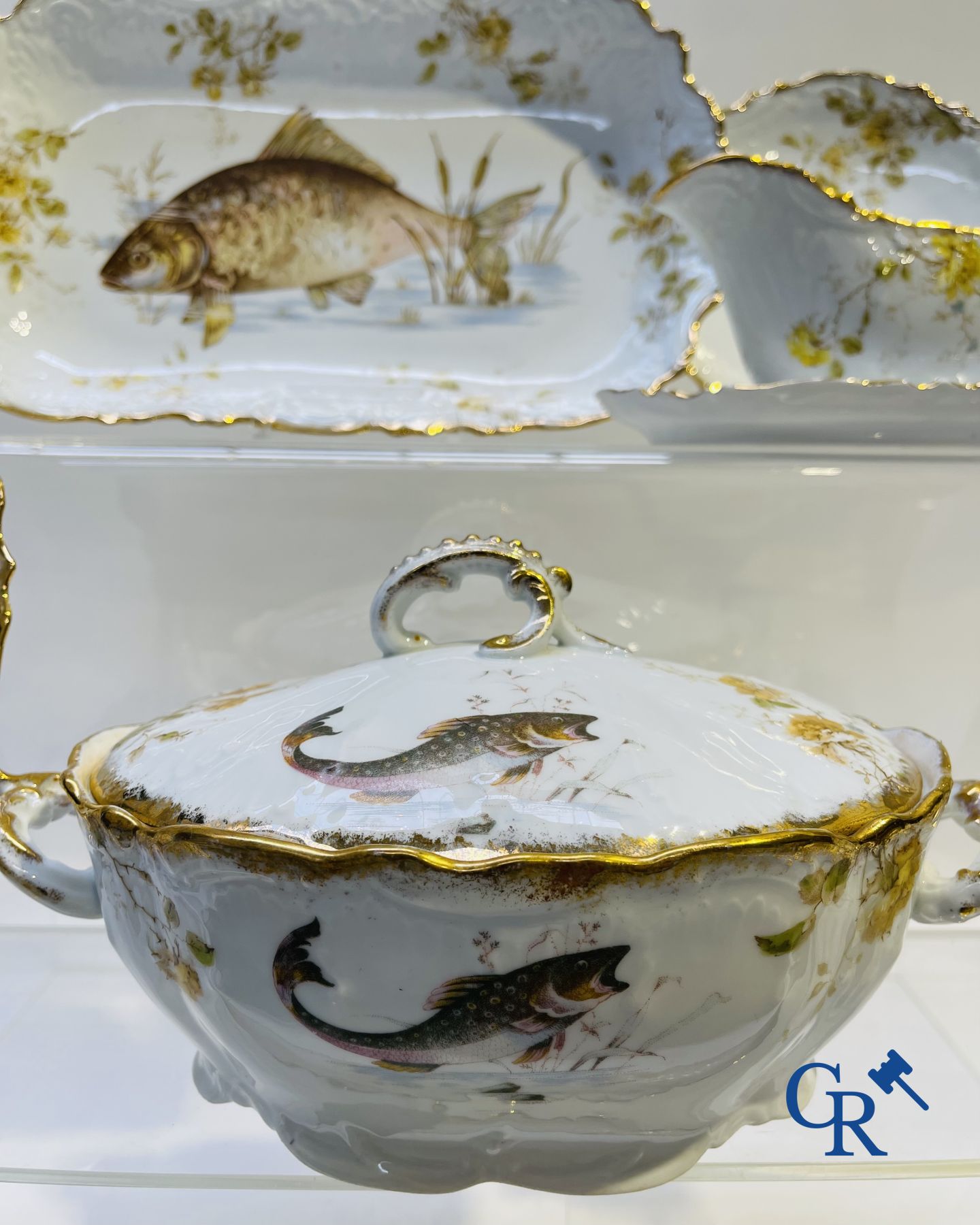 Extraordinary tableware in Brussels porcelain with a theme of freshwater fish.