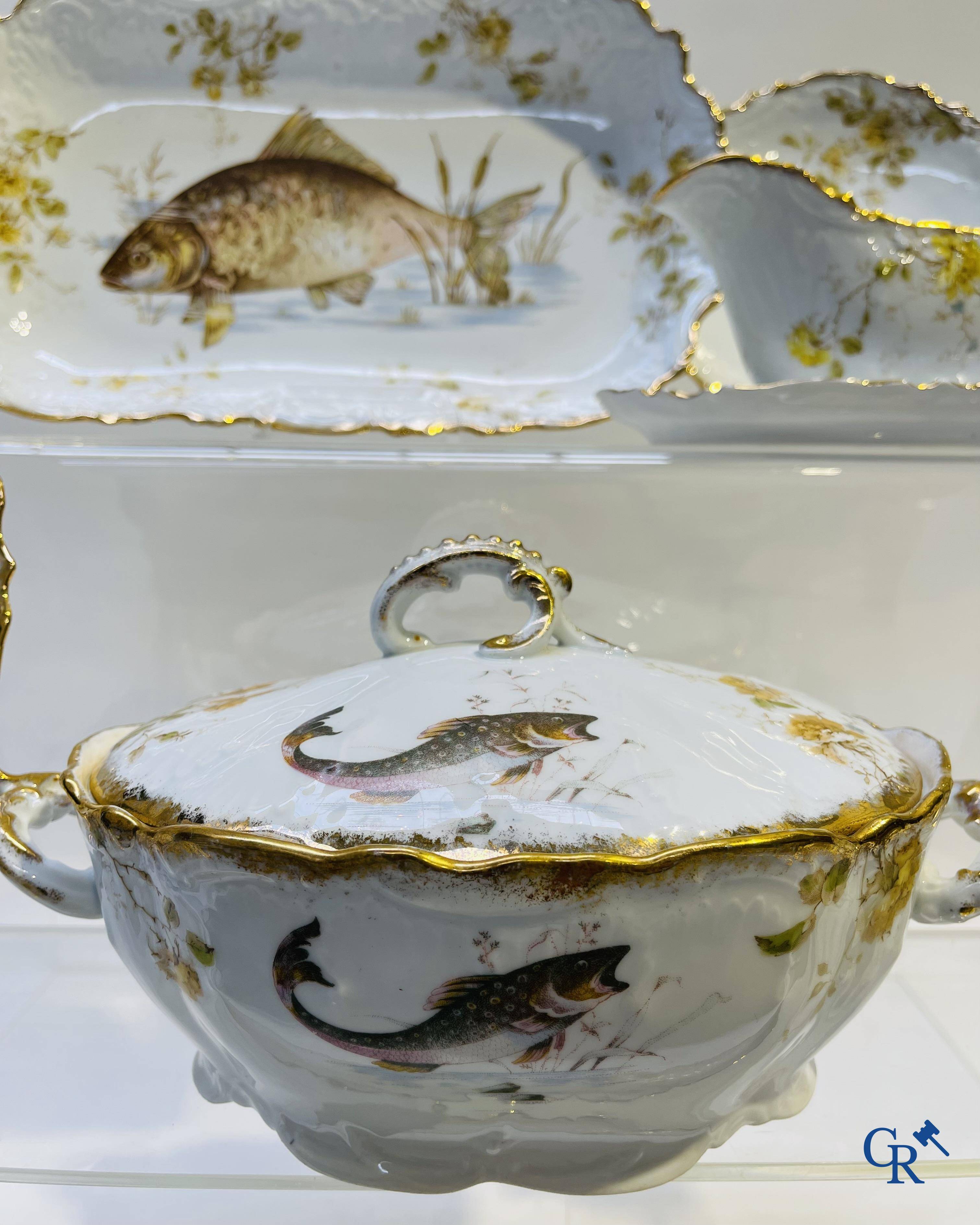 Extraordinary tableware in Brussels porcelain with a theme of freshwater fish.