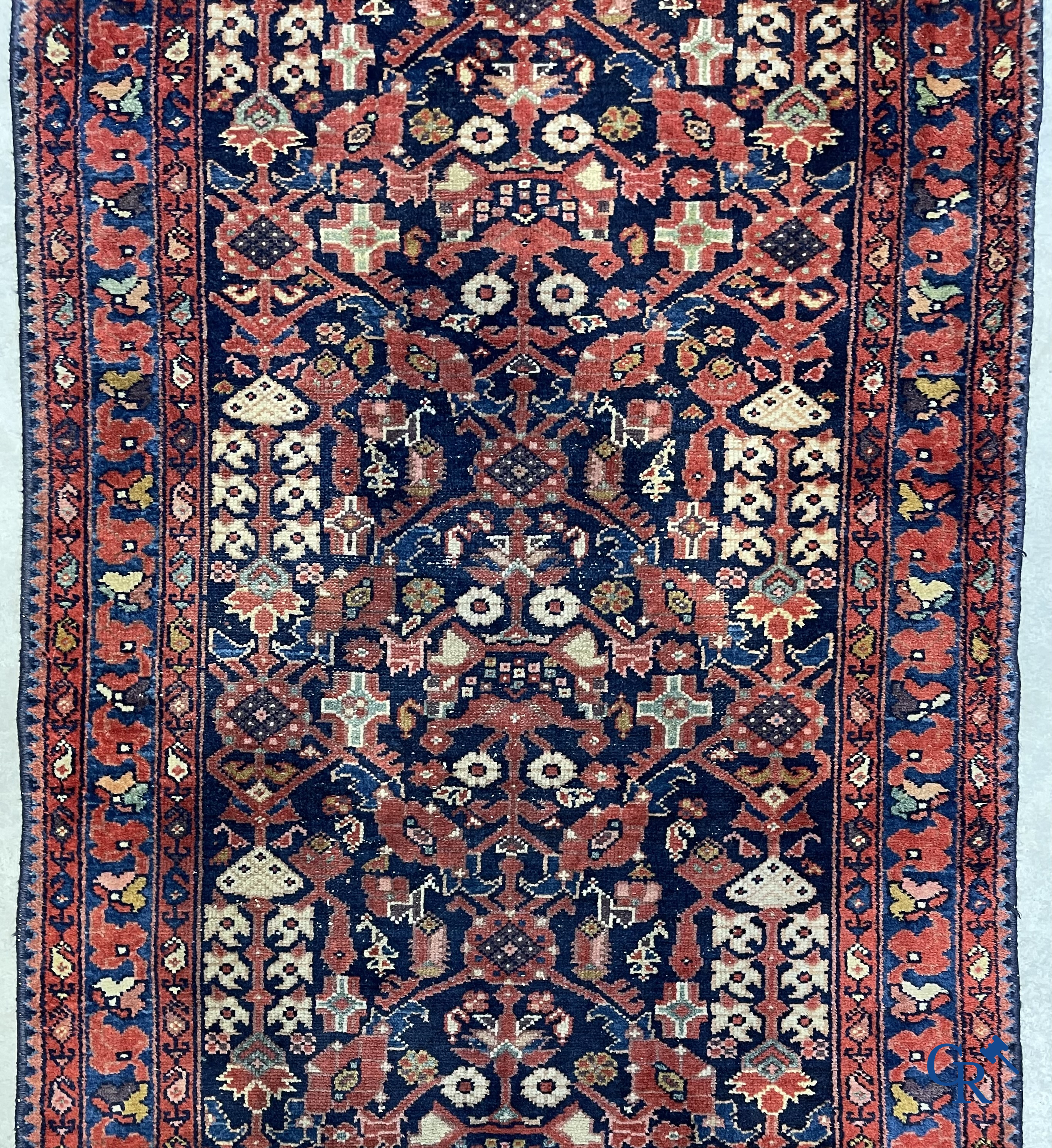 Oriental carpets: Antique hand-knotted Oriental carpet.