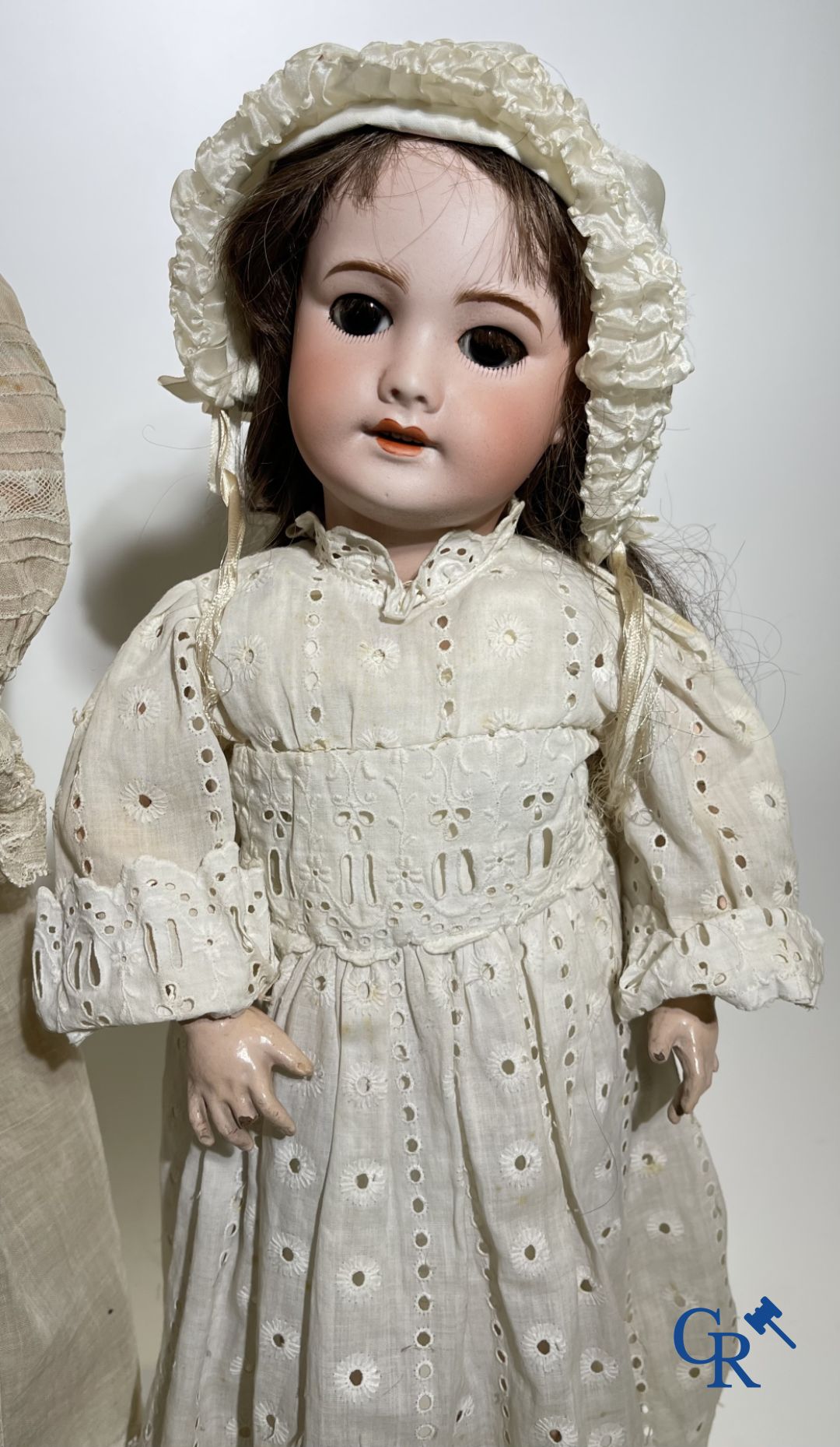 Toys: antique dolls: 2 dolls with porcelain head and a dog.