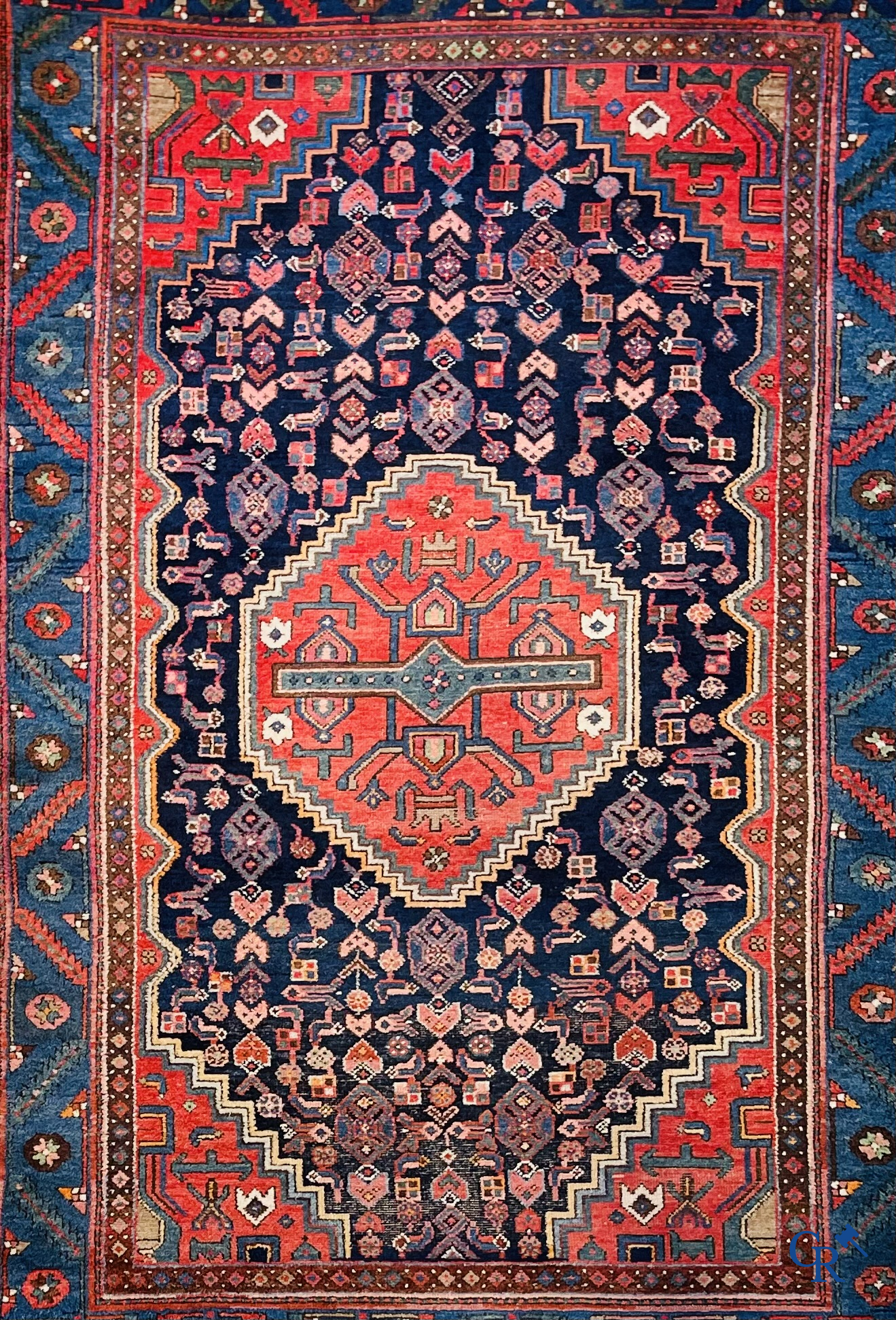 Oriental carpets, 2 antique hand-knotted Oriental carpets.