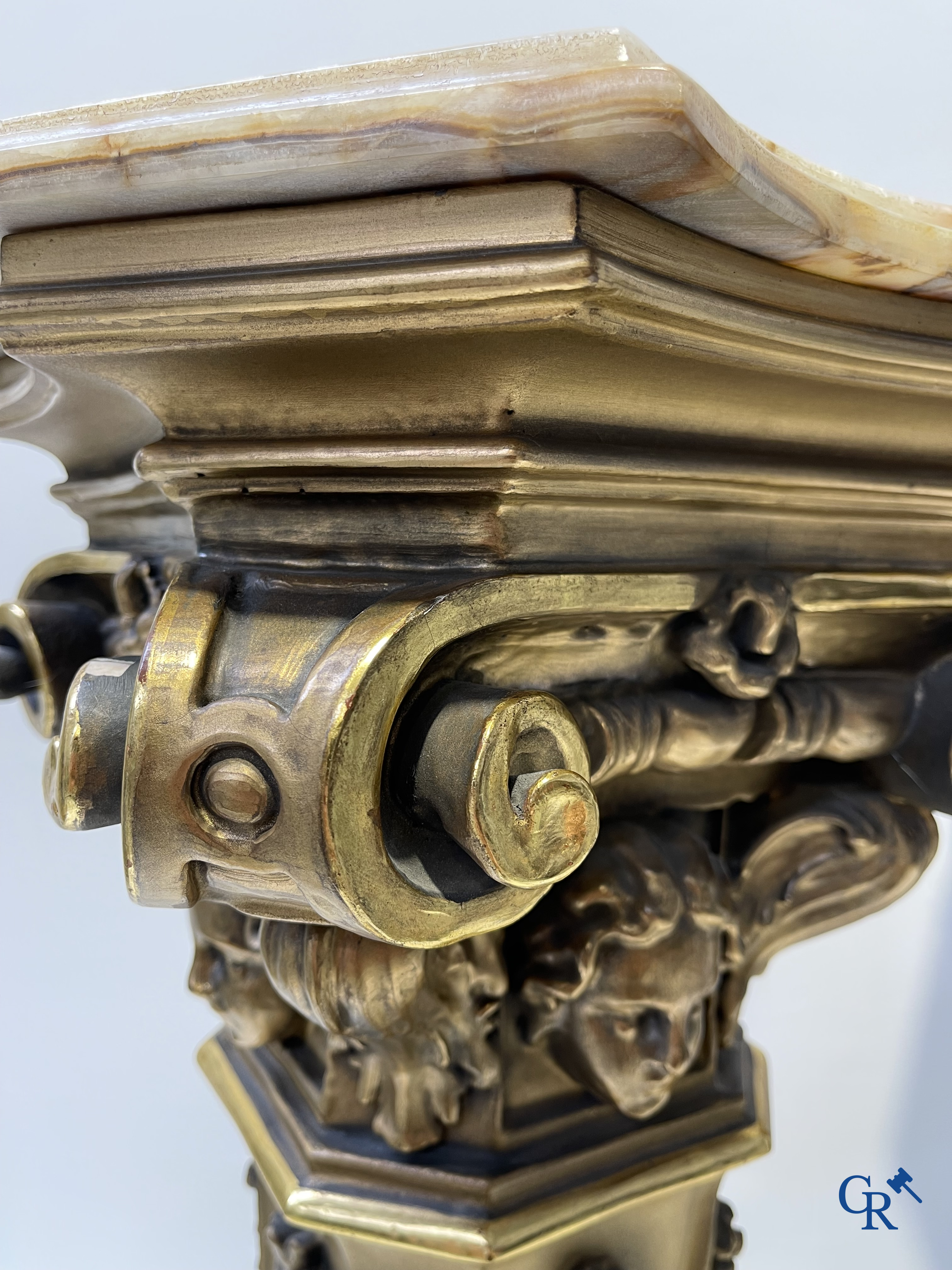 Pair of decorative gilded pedestals with onix top.