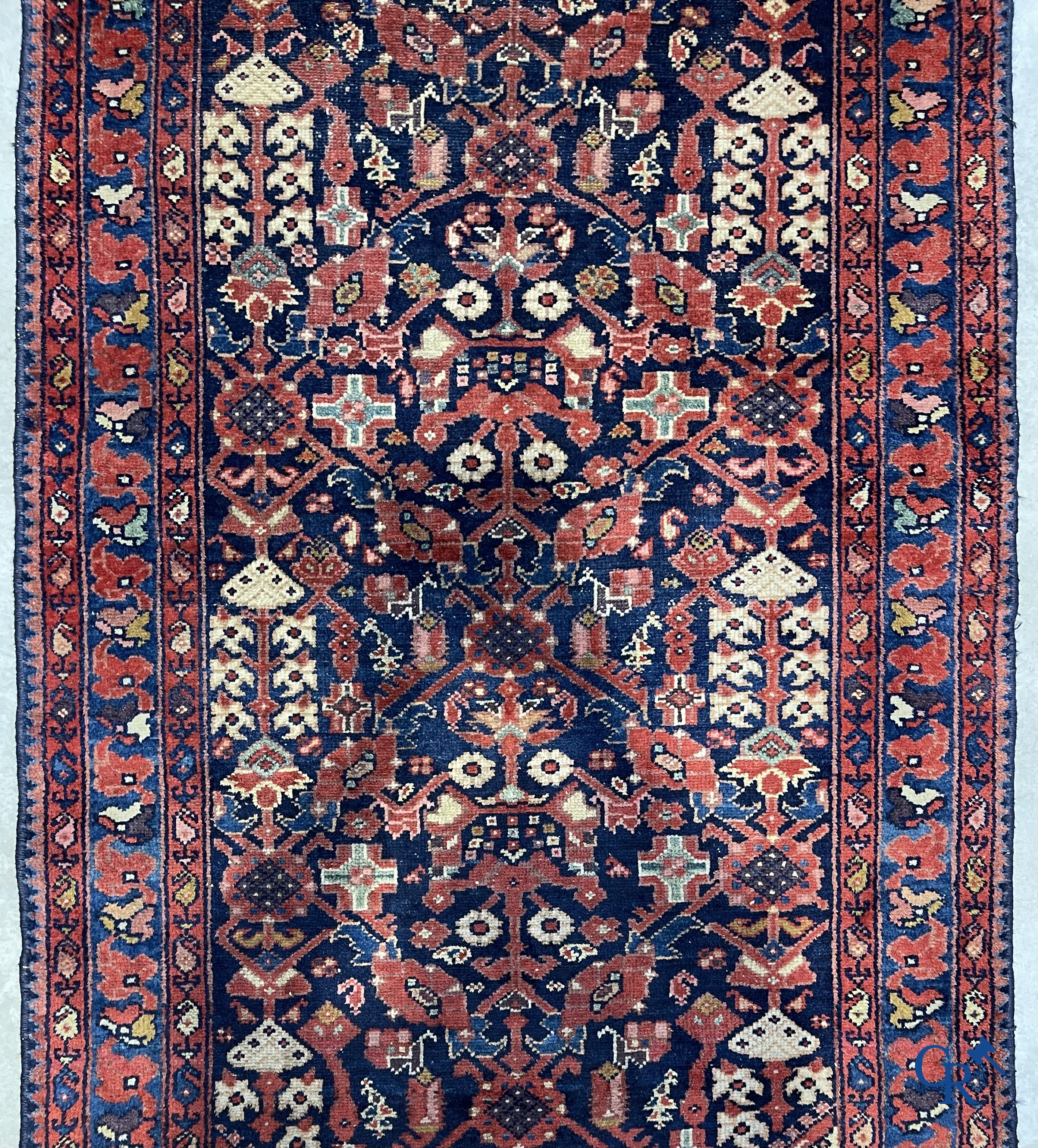 Tapis orientaux: Tapis oriental antique noué à la main.