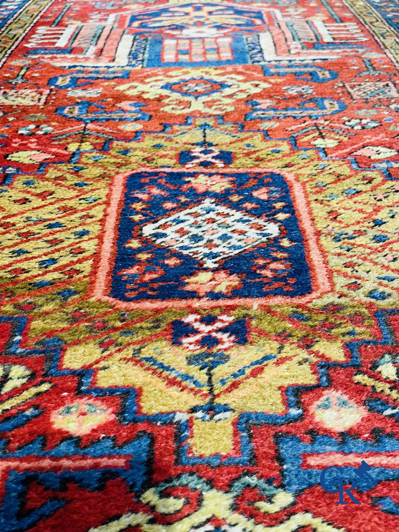 Oriental carpets: An antique oriental runner.