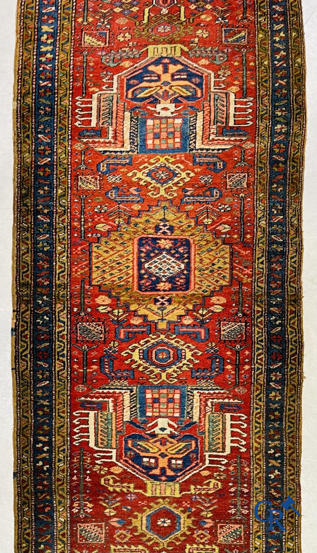 Oriental carpets: An antique oriental runner.