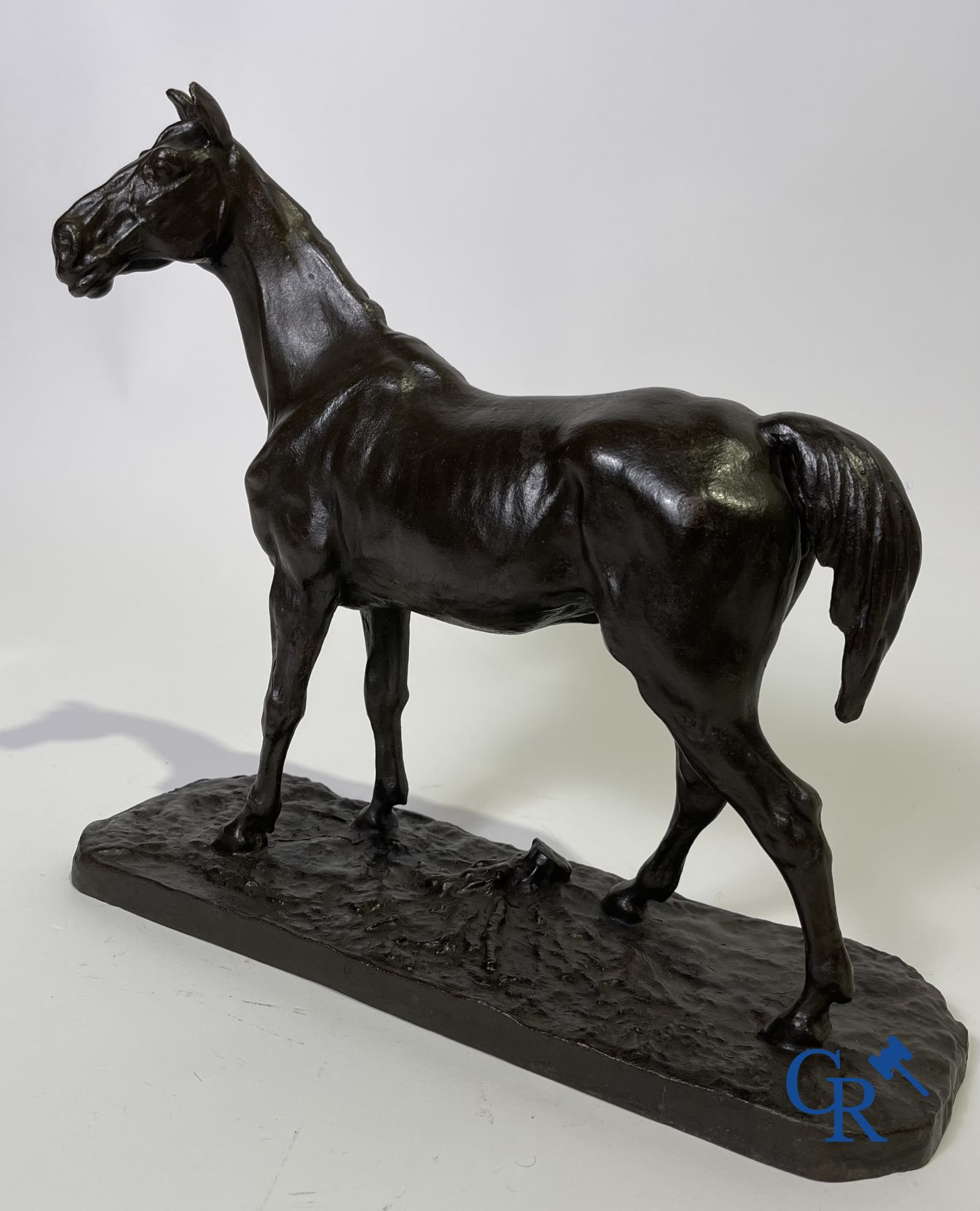 sculpture: 2 hunting bronzes and a horse in metal (cast iron).