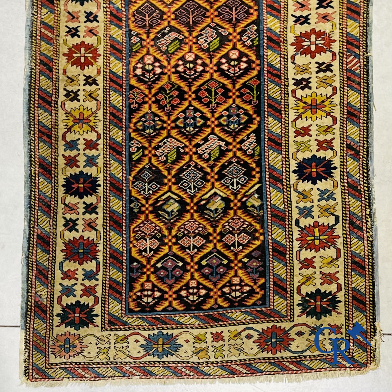 Oriental carpets: An antique oriental runner.