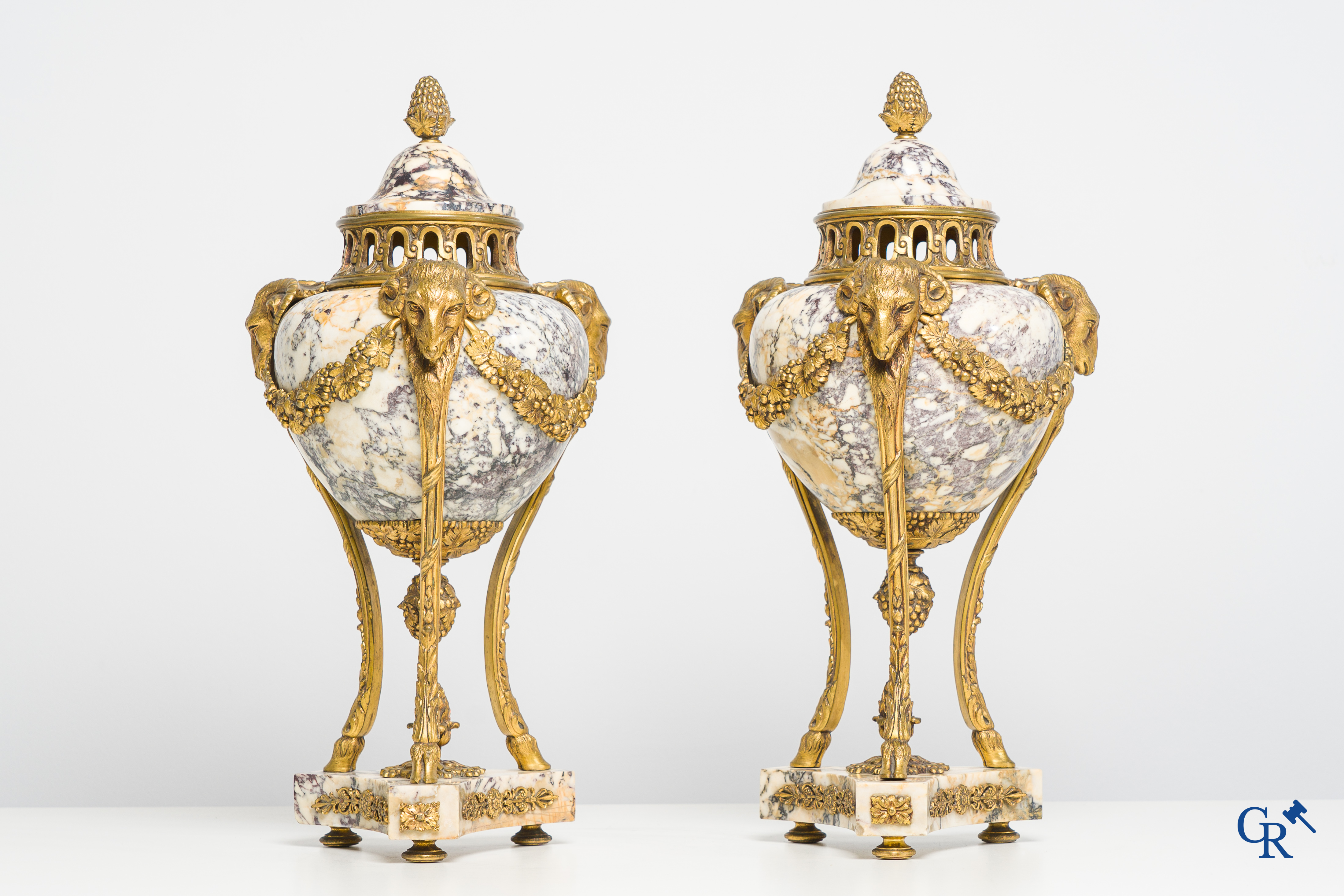 Pair of cassolettes in marble brèche violette with finely decorated and gilded bronze frames. Louis XVI style. 