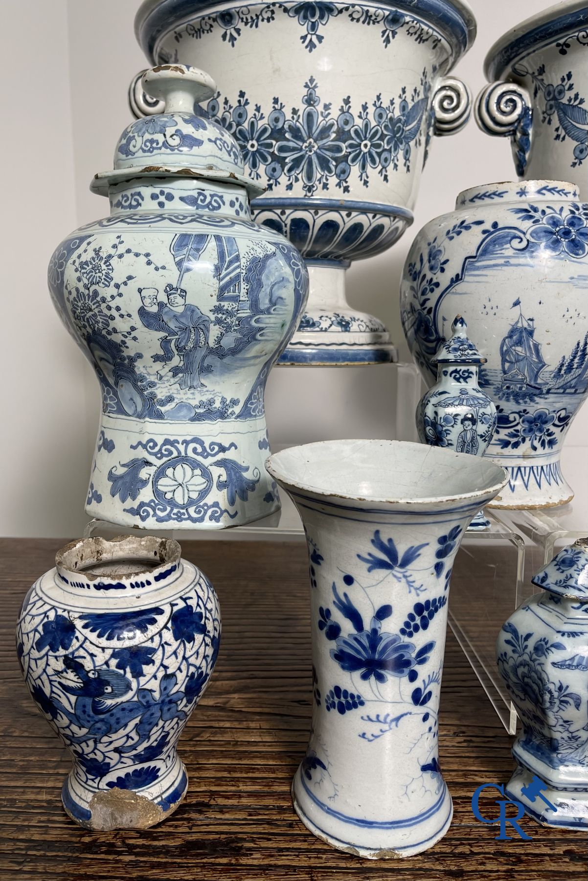 Delft: 11 pieces of blue and white faience with different décors. 17th - 18th century.