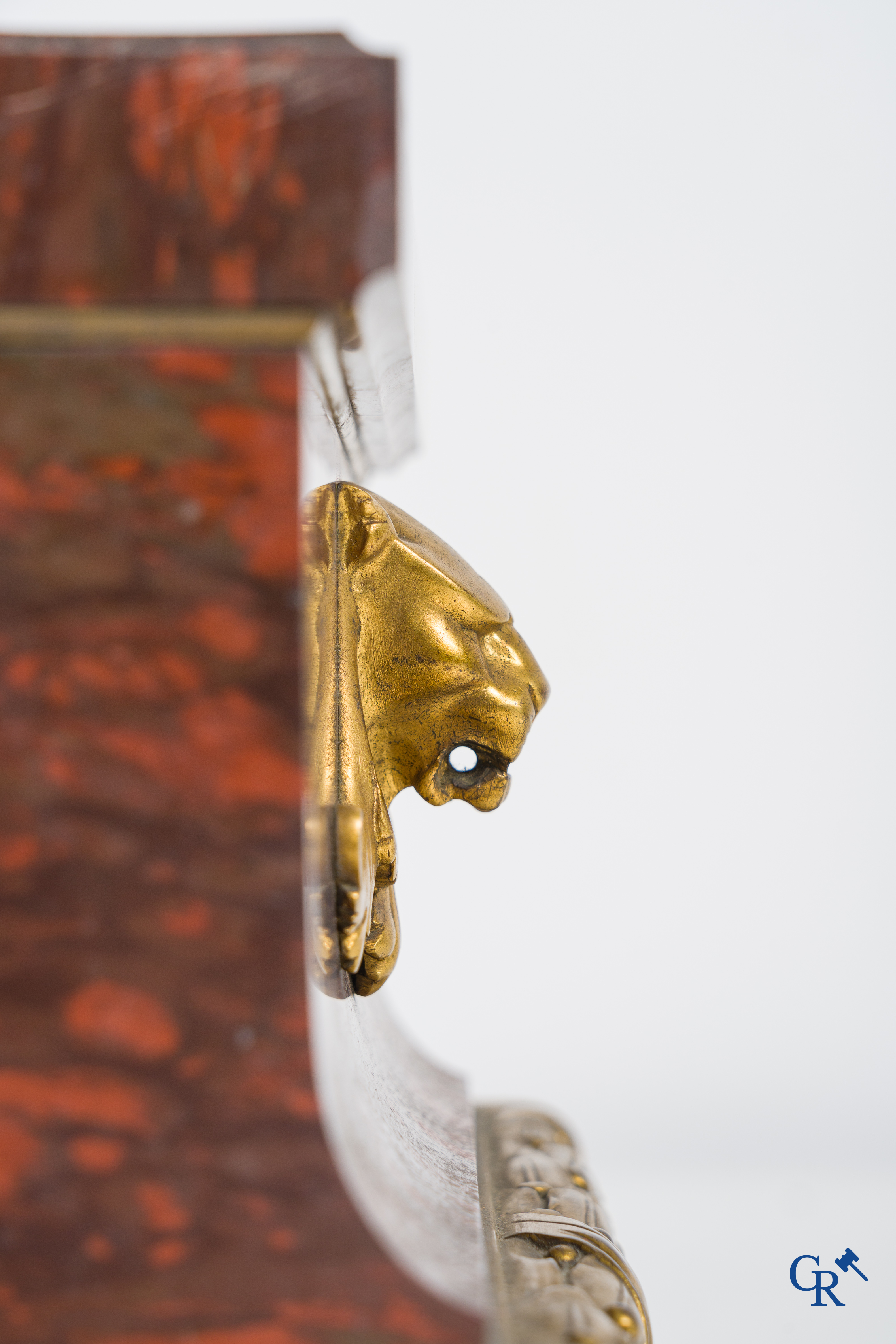 F. Barbedienne Fondeur, a bronze statue in the antique style with brown patina and gilding on a marble pedestal.