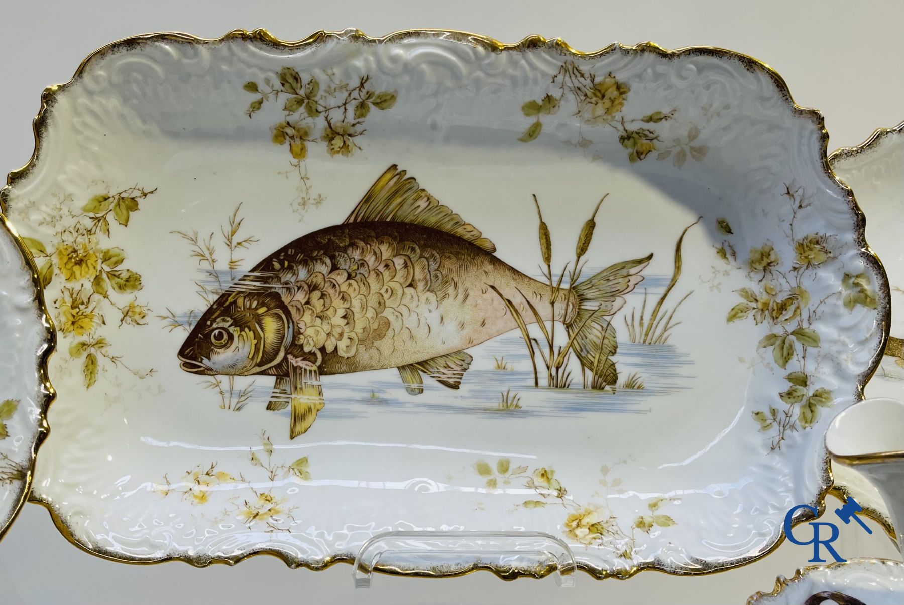 Extraordinary tableware in Brussels porcelain with a theme of freshwater fish.